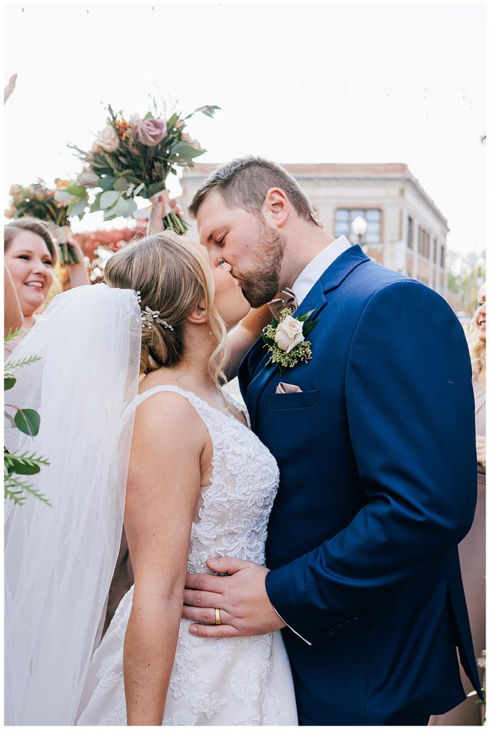 Husband and wife kiss at Holly Vault Chapel 