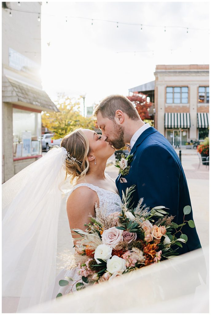 Couple kisses for Detroit Wedding Photographer