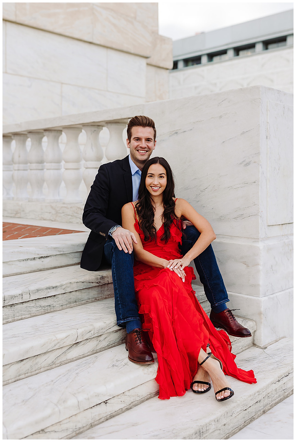 Two people sit on steps for Detroit Wedding Photographer