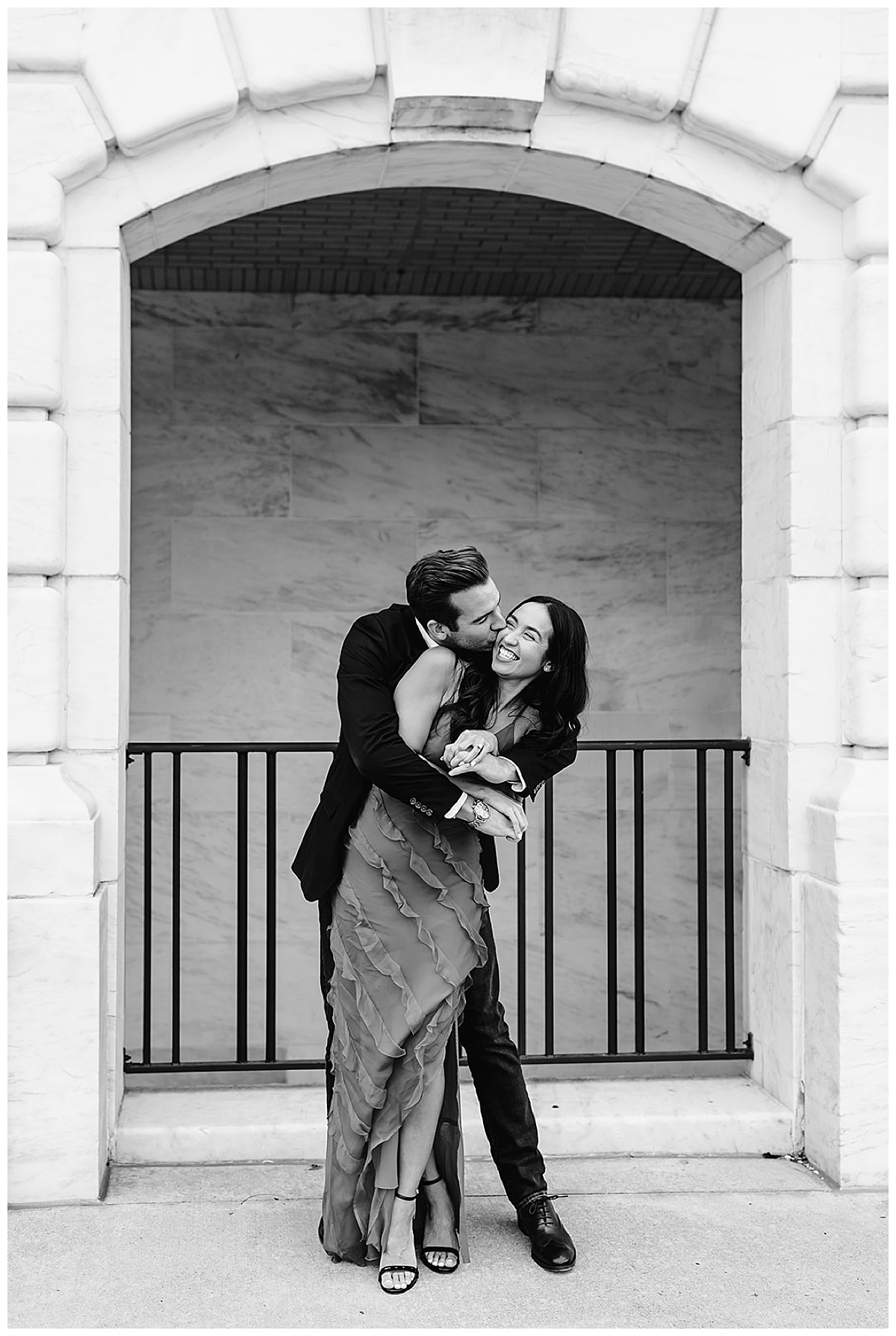Two people kiss and hug for Detroit Wedding Photographer