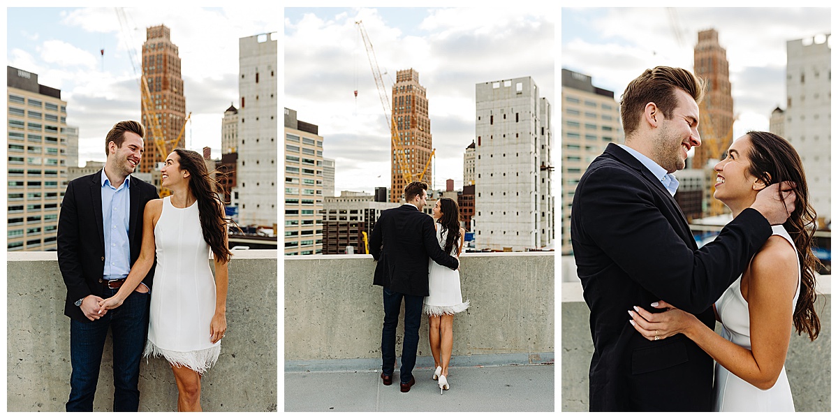 Couple smile together on rooftop for Detroit Wedding Photographer