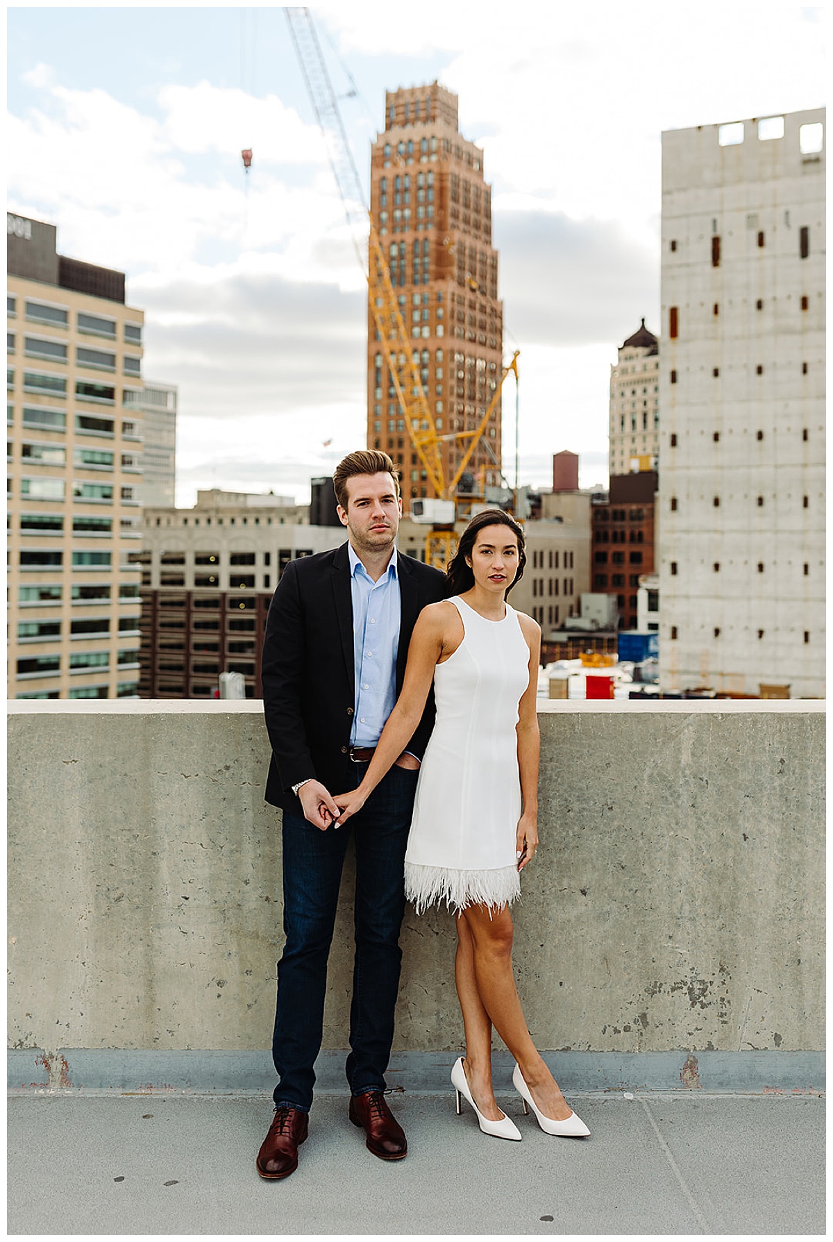 Future bride and groom with a serious smile for Kayla Bouren Photography 