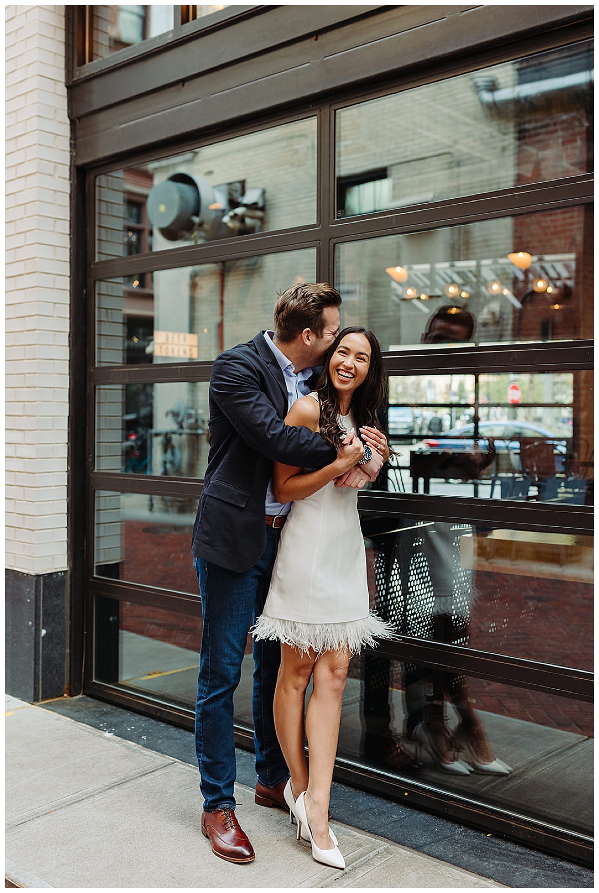 Man hugs and kisses woman for DIA Engagement Session