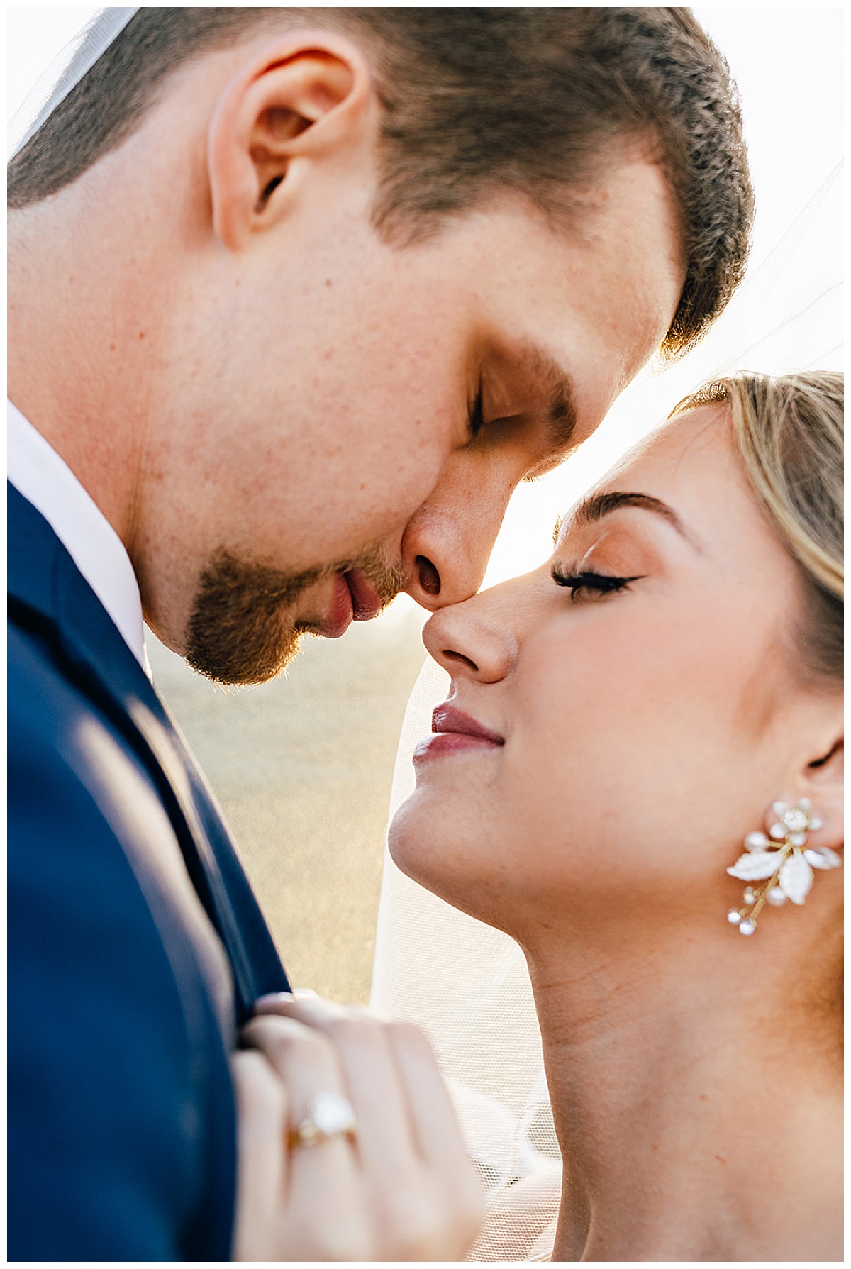 Husband and wife share intimate moment with one another for Detroit Wedding Photographer