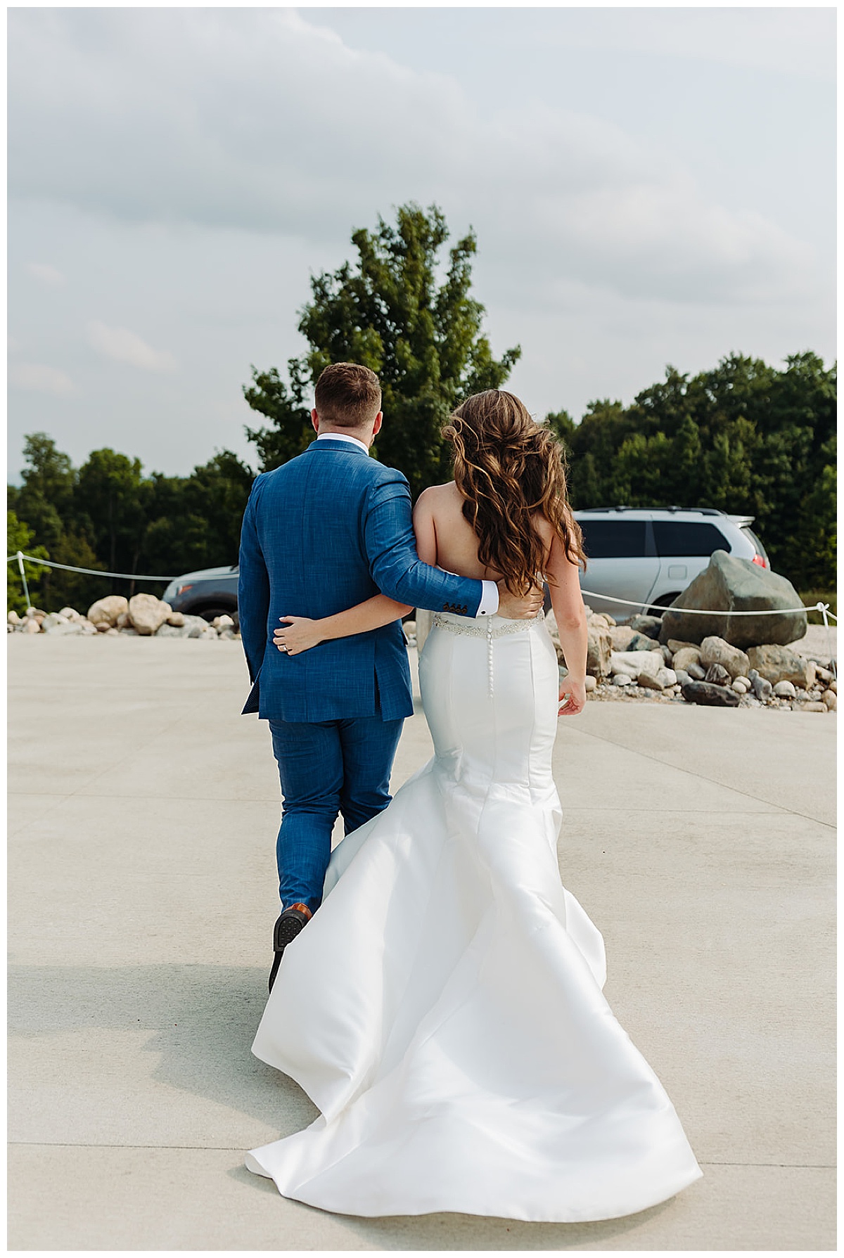 Husband and wife walk together for  Detroit Wedding Photographer