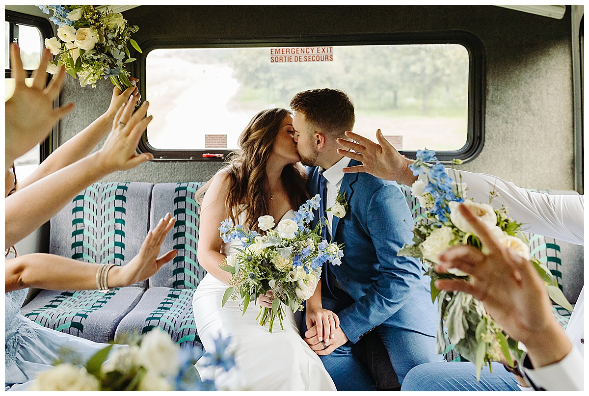 Couple kisses in limo for Detroit Wedding Photographer