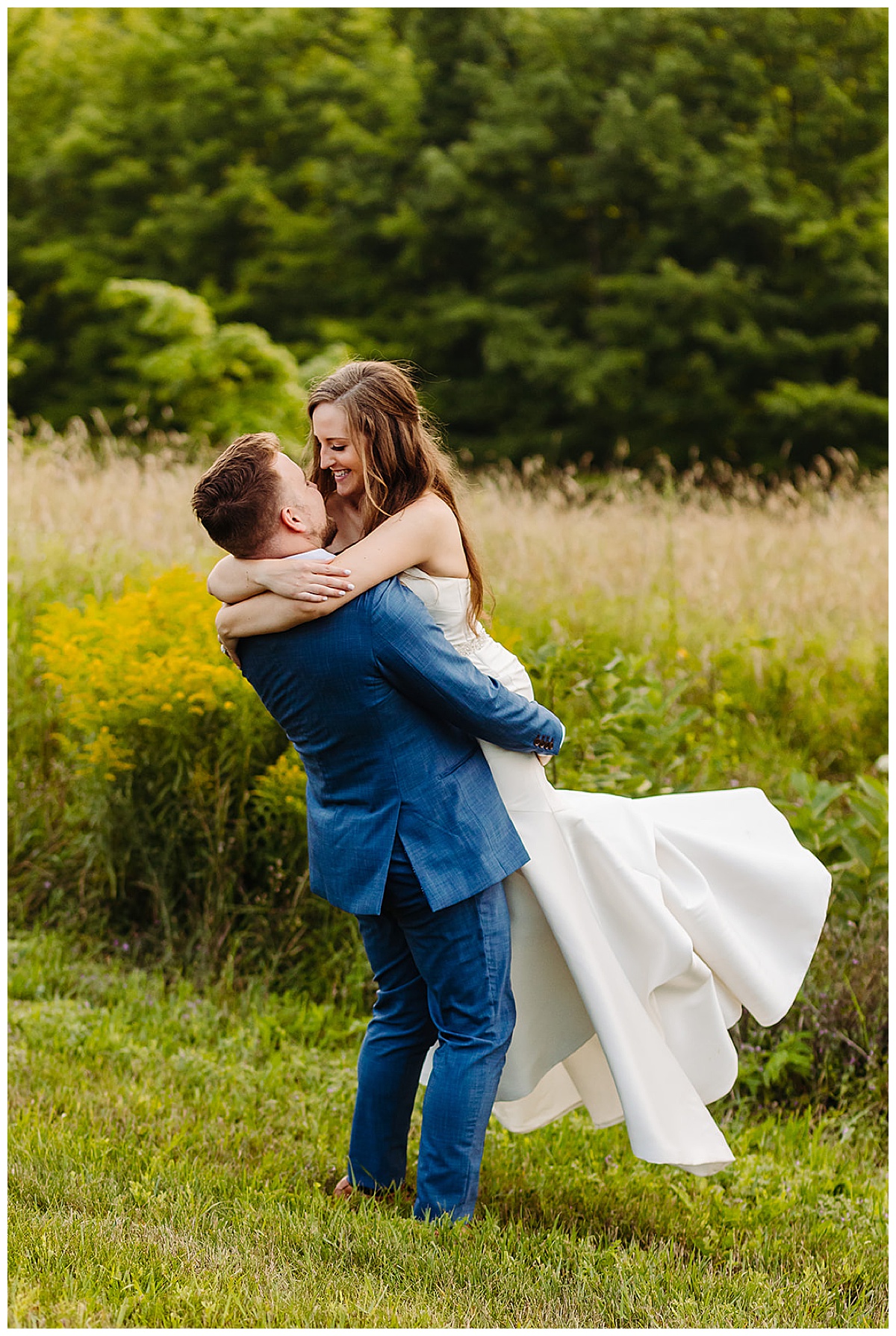 Husband and wife embrace in a hug at Bayview Weddings