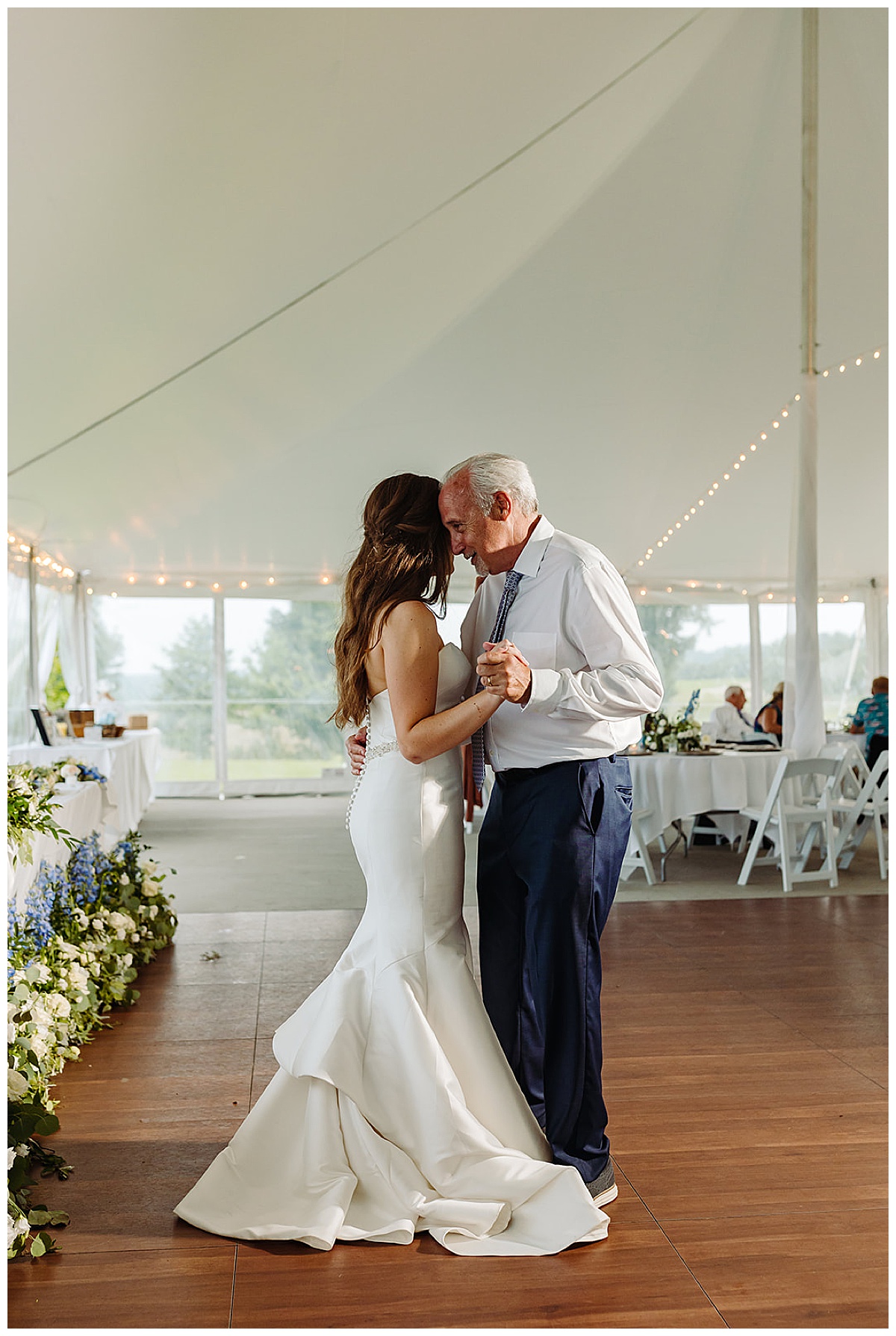Father and daughter dance together at Bayview Weddings