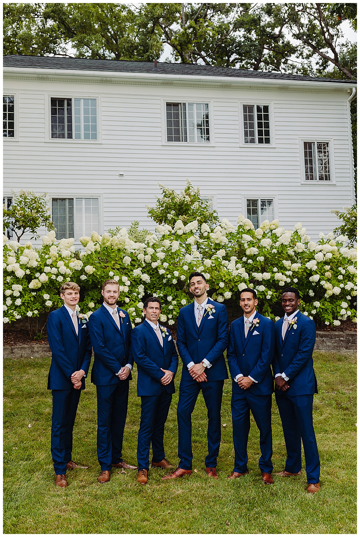 Groomsmen stand together for Detroit Wedding Photographer