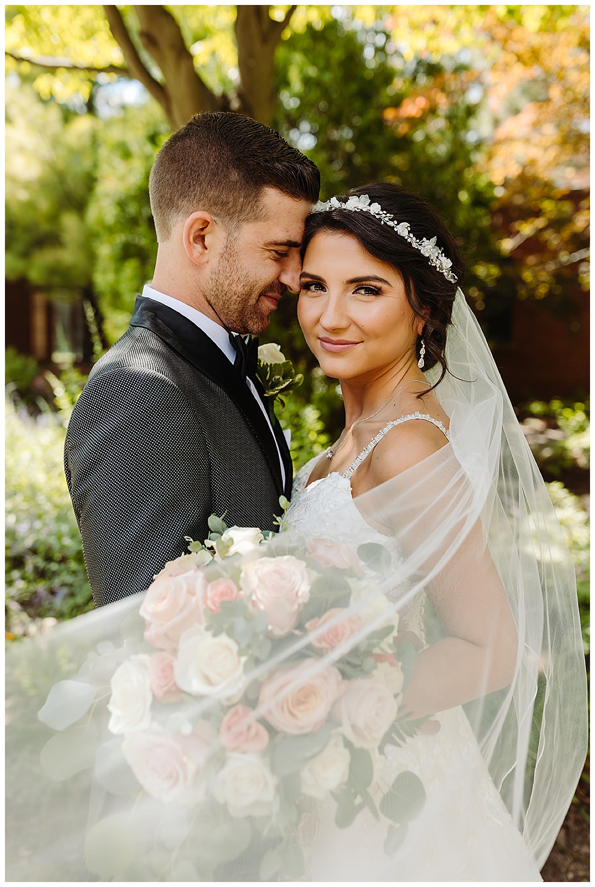 Man smiles close to woman for Detroit Wedding Photographer