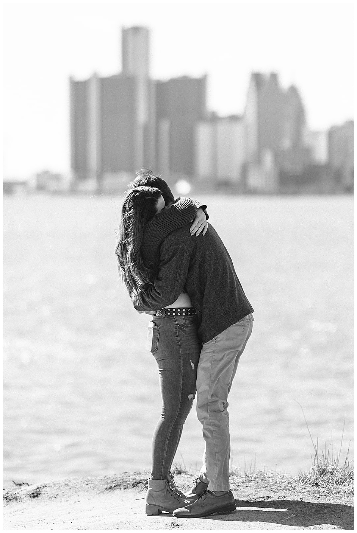 Guy embraces woman for Kayla Bouren Photography