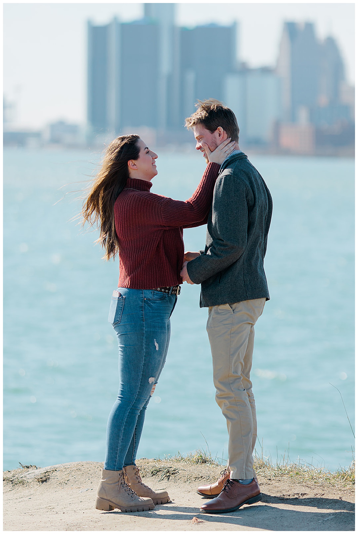 Girl holds guys face close for Sunset Point Proposal