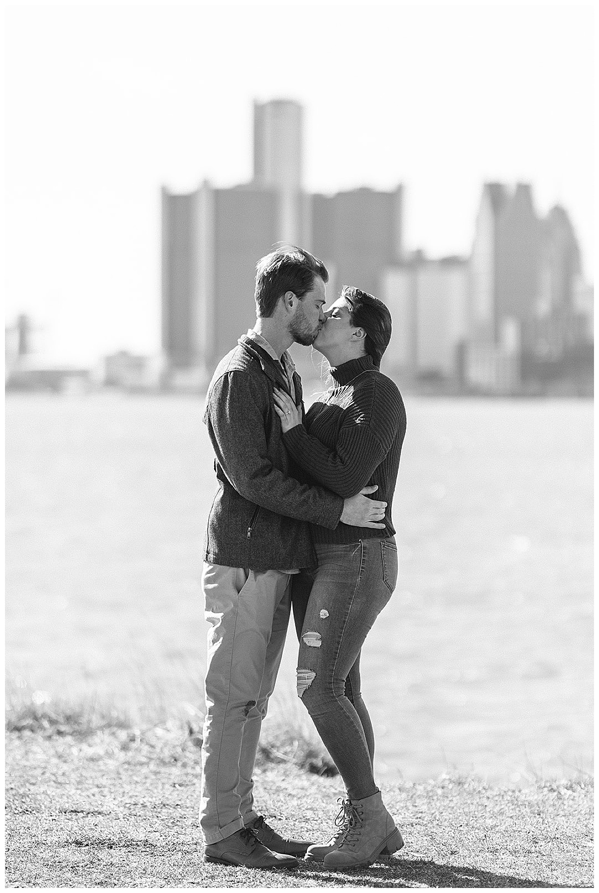 Man and woman share a kiss for Detroit Wedding Photographer