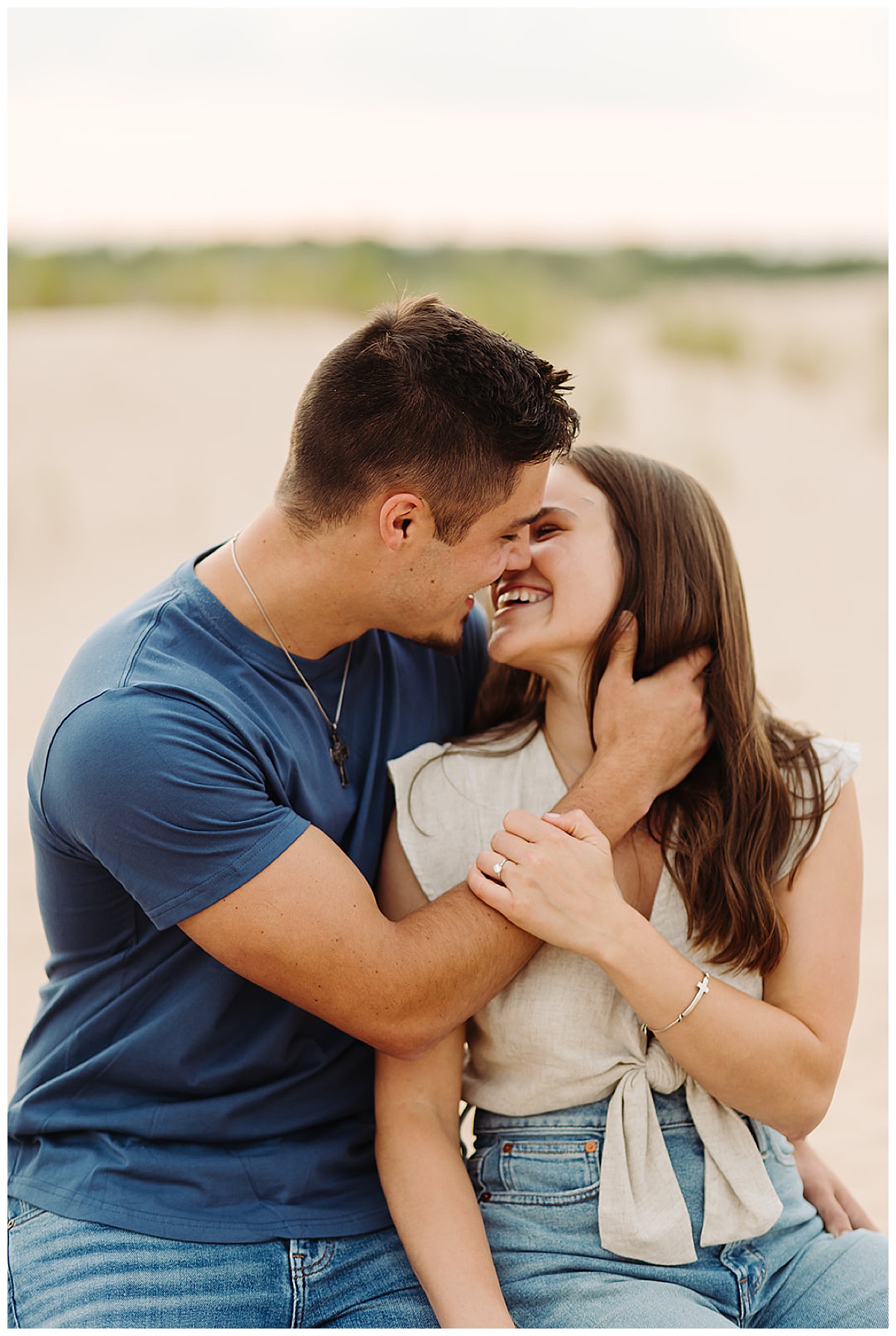 Man and woman smile together for Kayla Bouren Photography