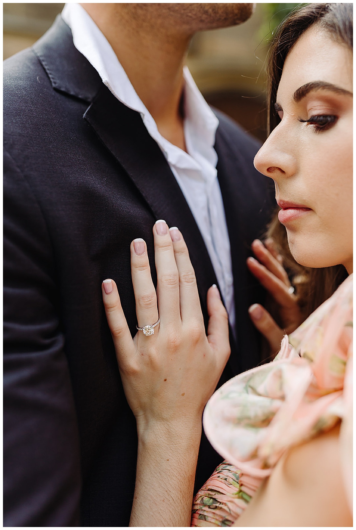 Woman rests hand on chest for Detroit Wedding Photographer