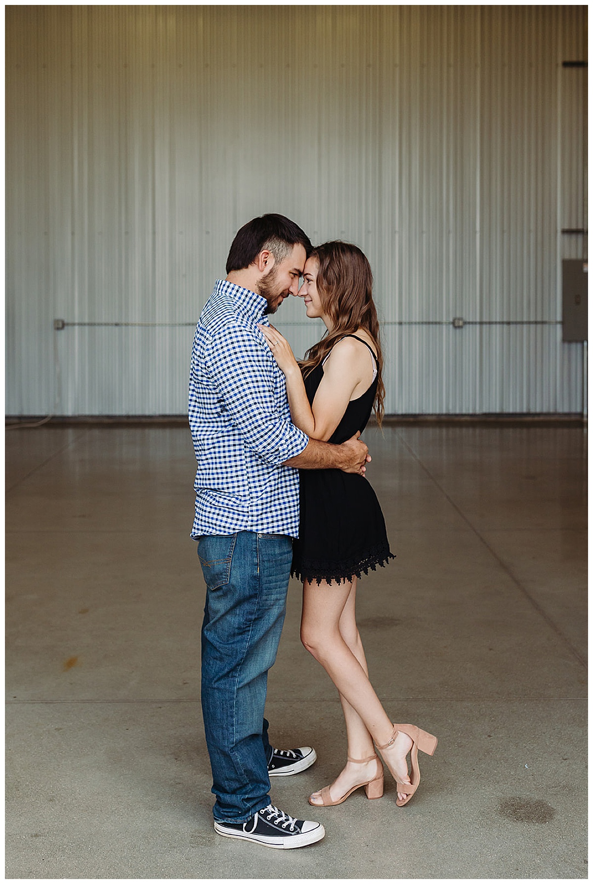 Man and woman cuddle in close together for Kayla Bouren Photography