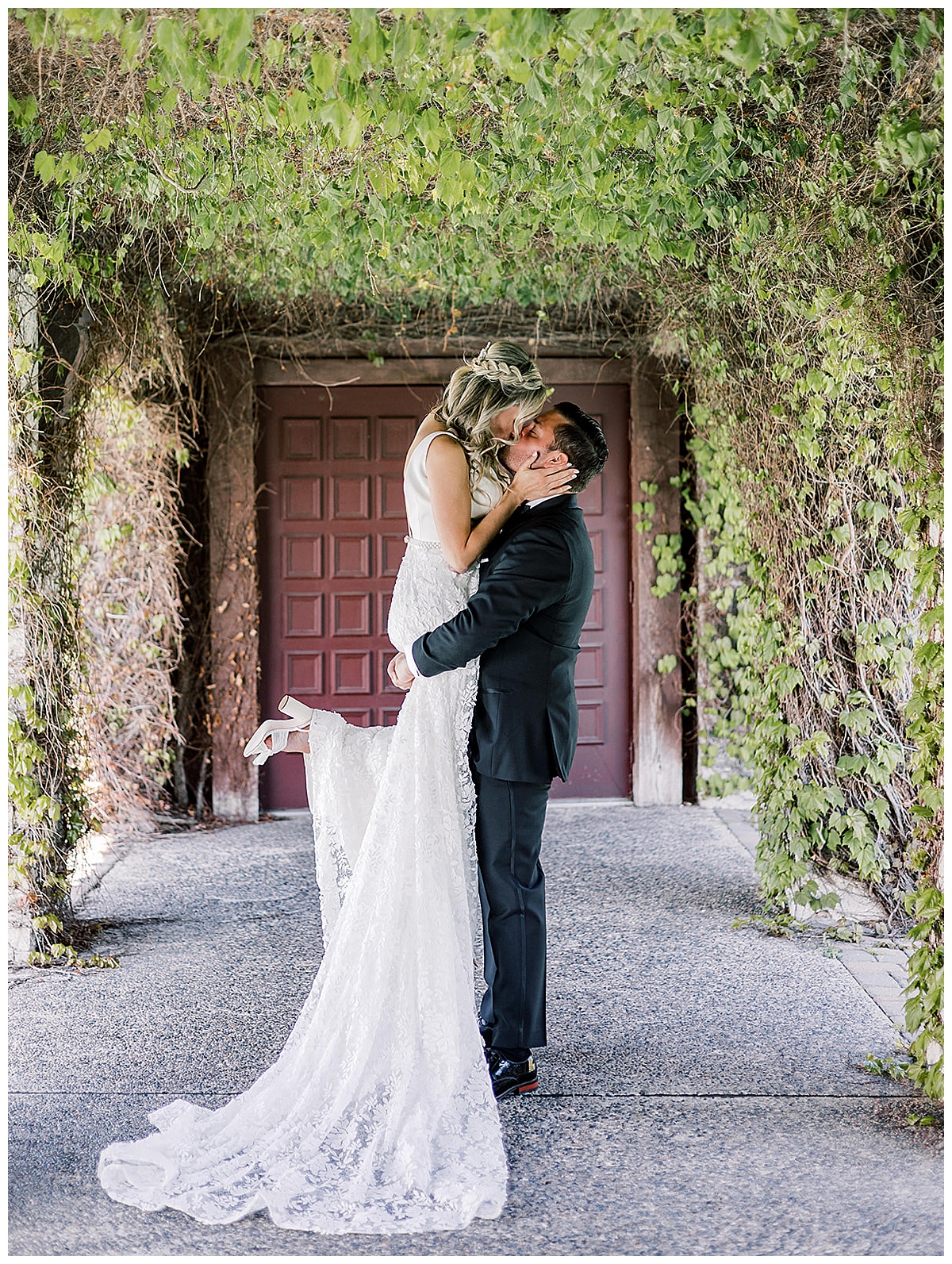 Man and woman share a kiss for Kayla Bouren Photography