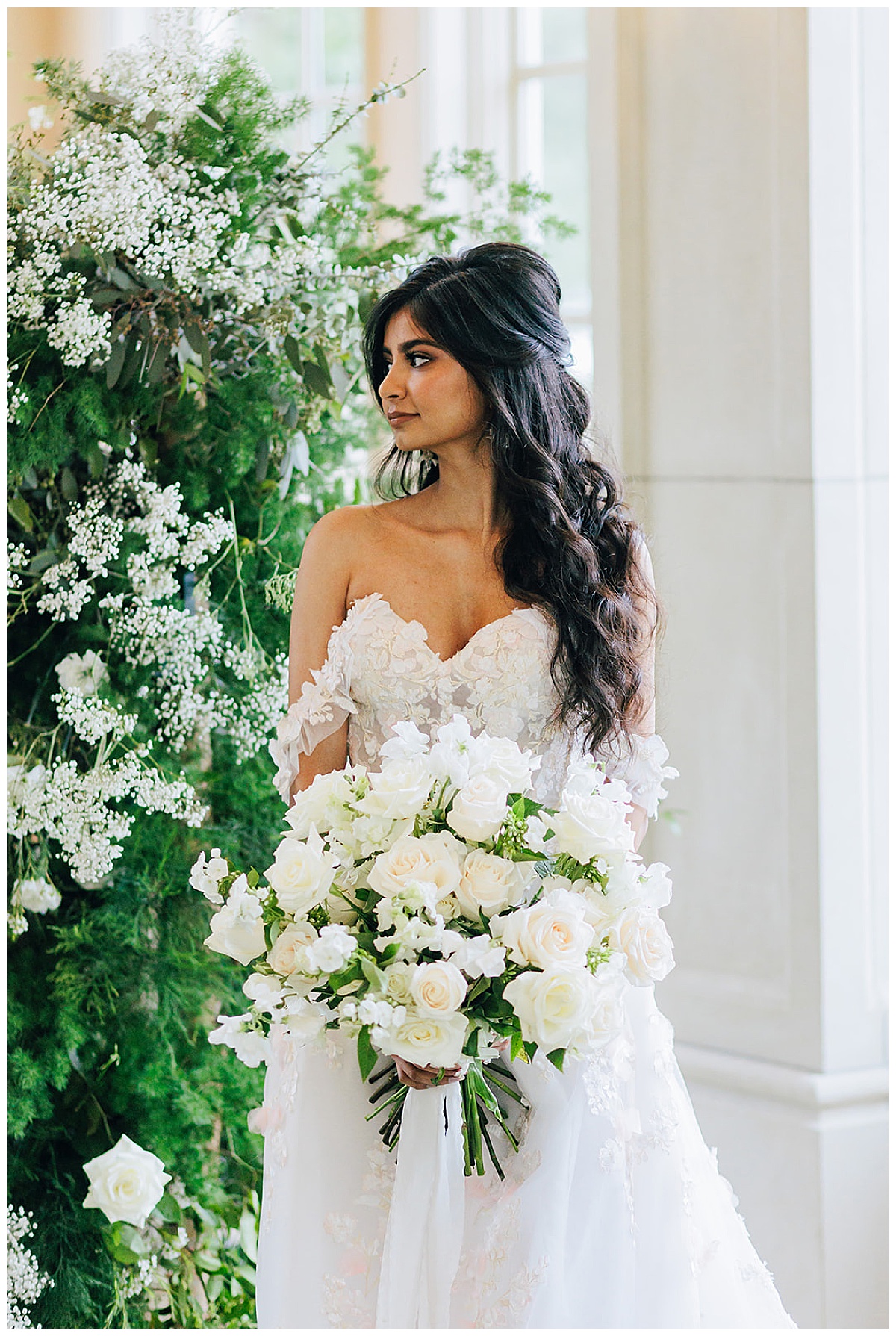 Adult holds bridal bouquet and smiles big for Kayla Bouren Photography