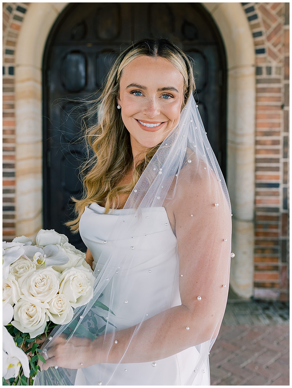 Bride smiles big for Kayla Bouren Photography