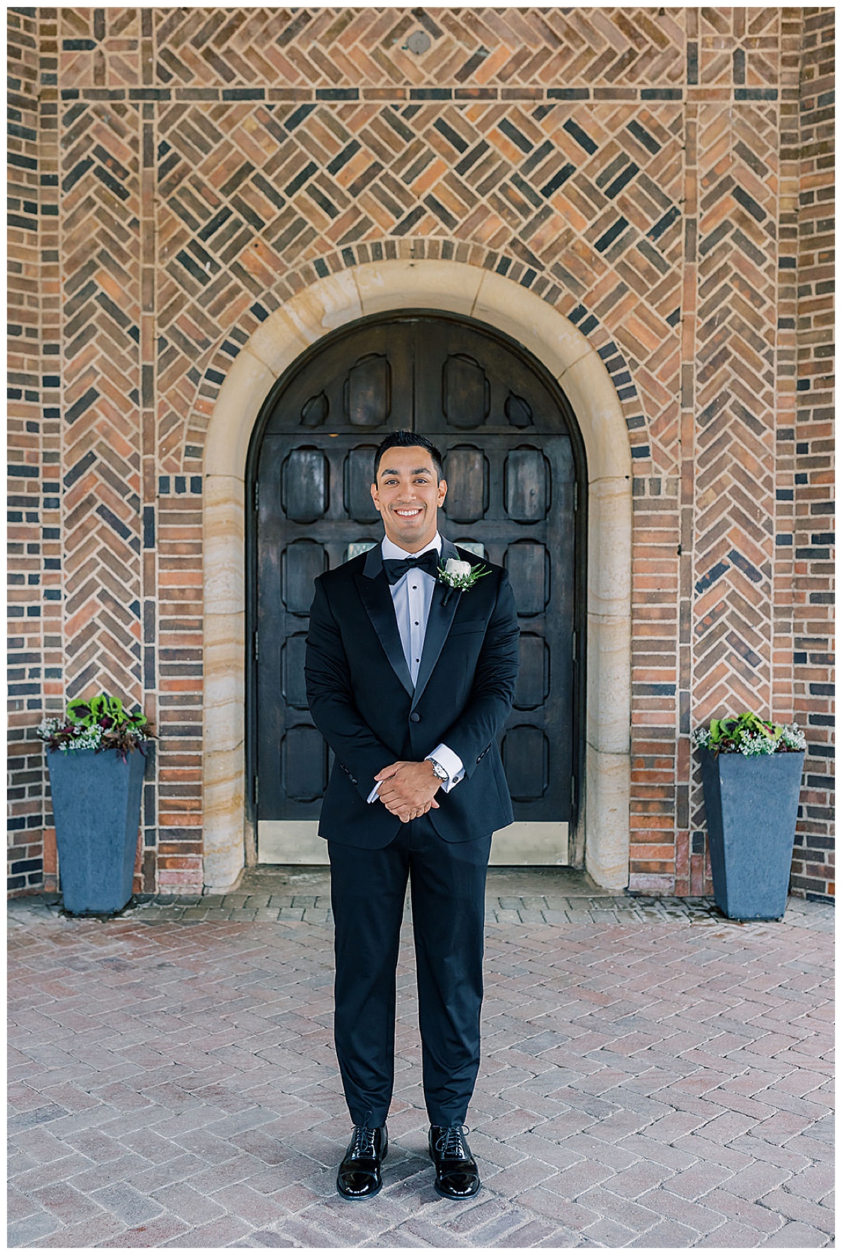 Groom stands tall for Detroit Wedding Photographer
