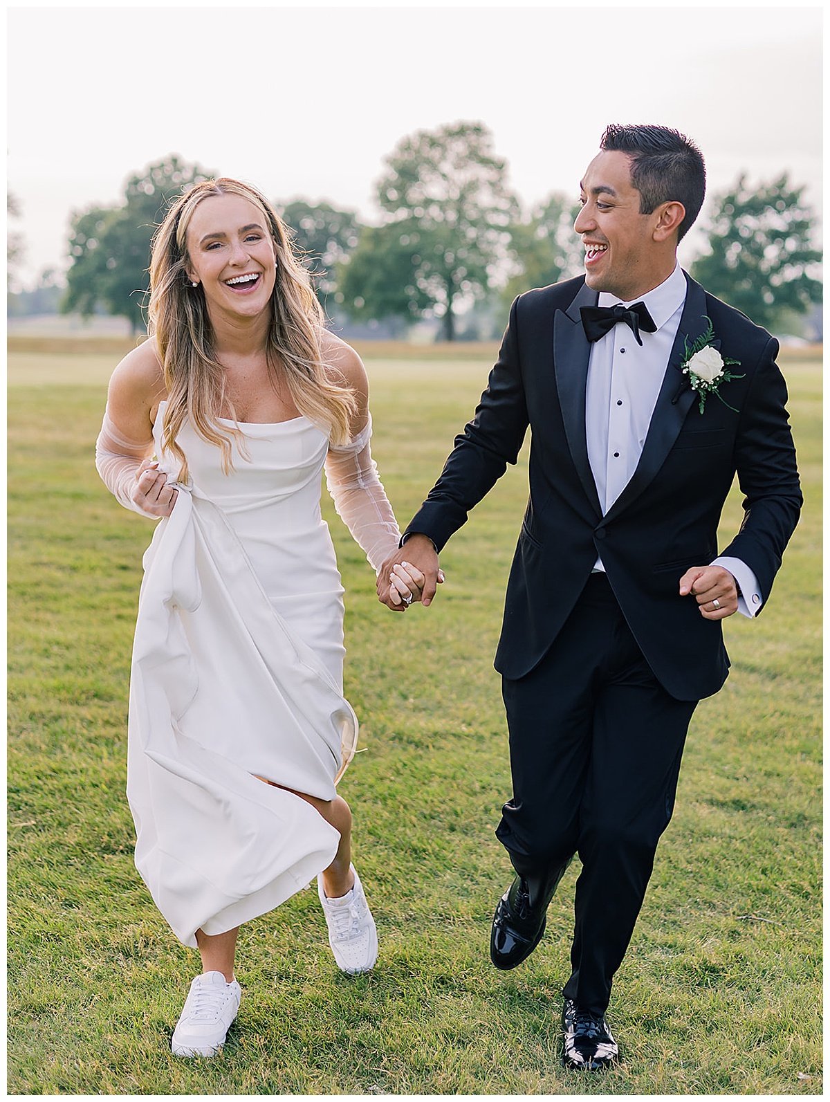 Couple walks and run together for Detroit Wedding Photographer