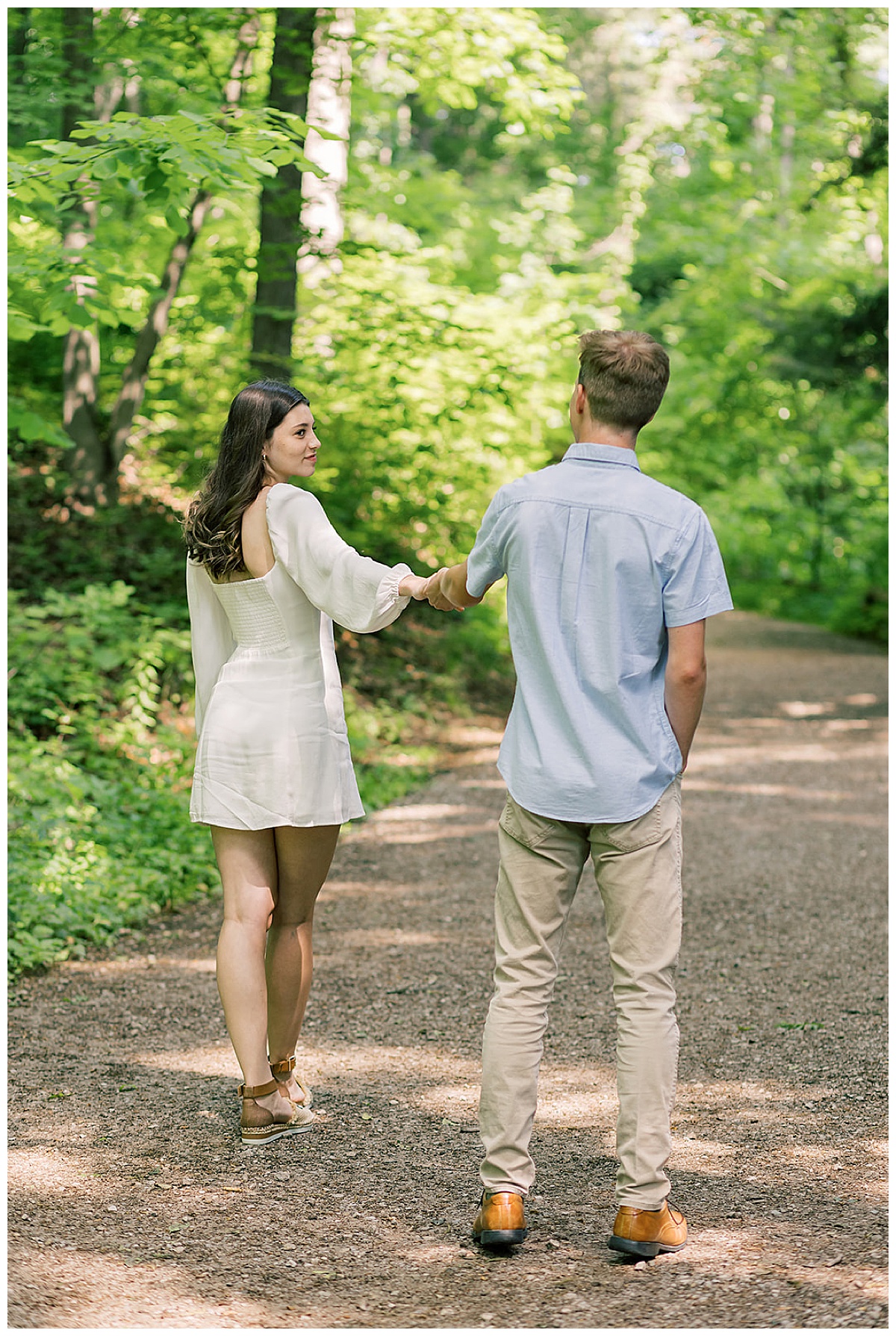 Two people walk together for Kayla Bouren Photography