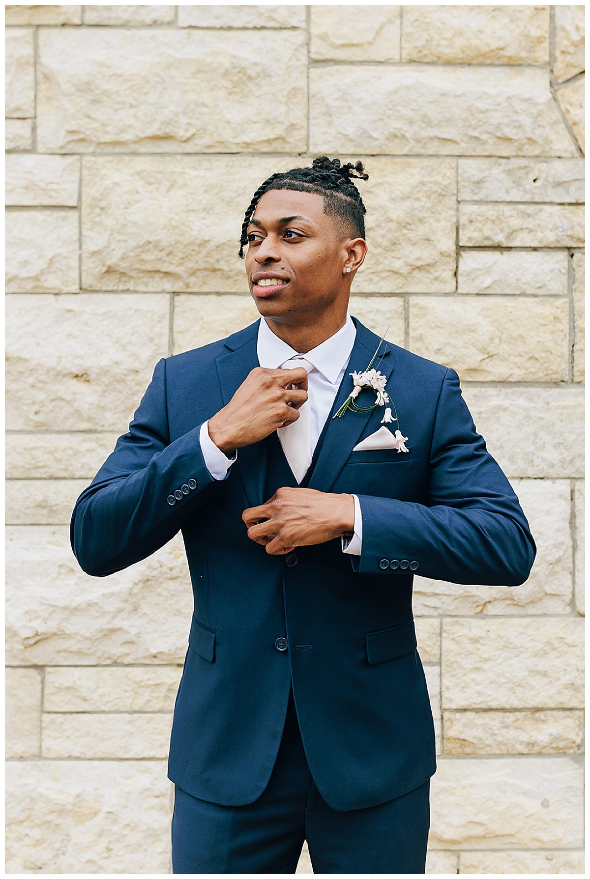 Guy gets dressed during perfectly executed Wedding Photography Timeline