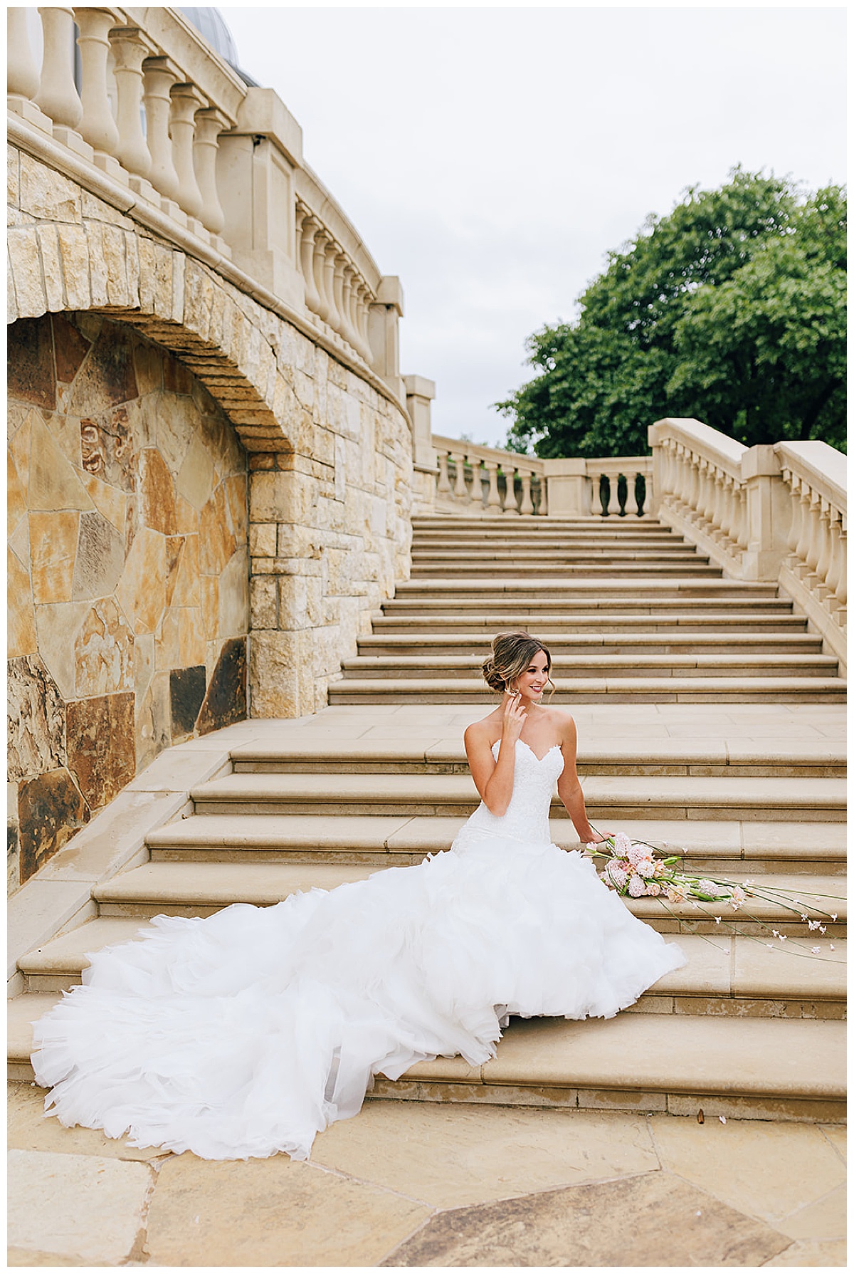 Lady sits on the stairs for perfectly executed Wedding Photography Timeline