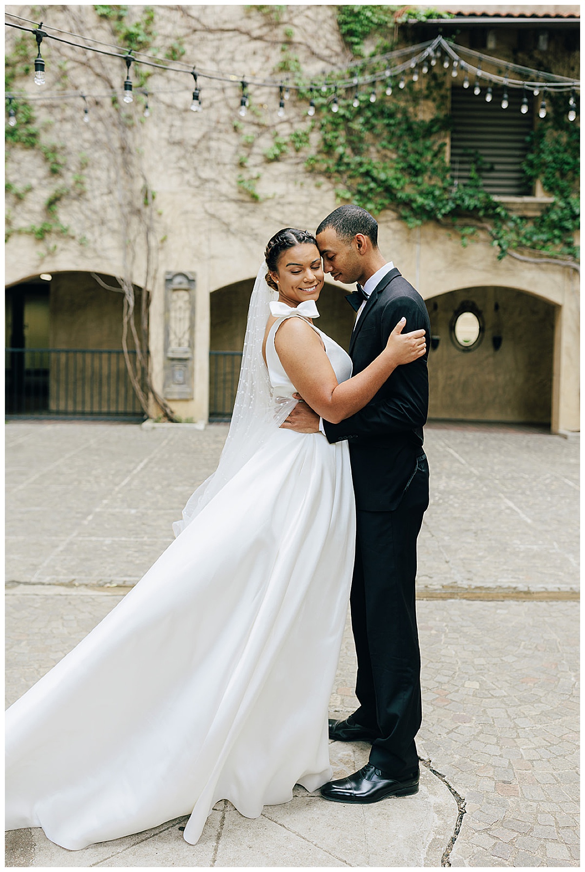 Man brings woman in close for an intimate hug for Kayla Bouren Photography