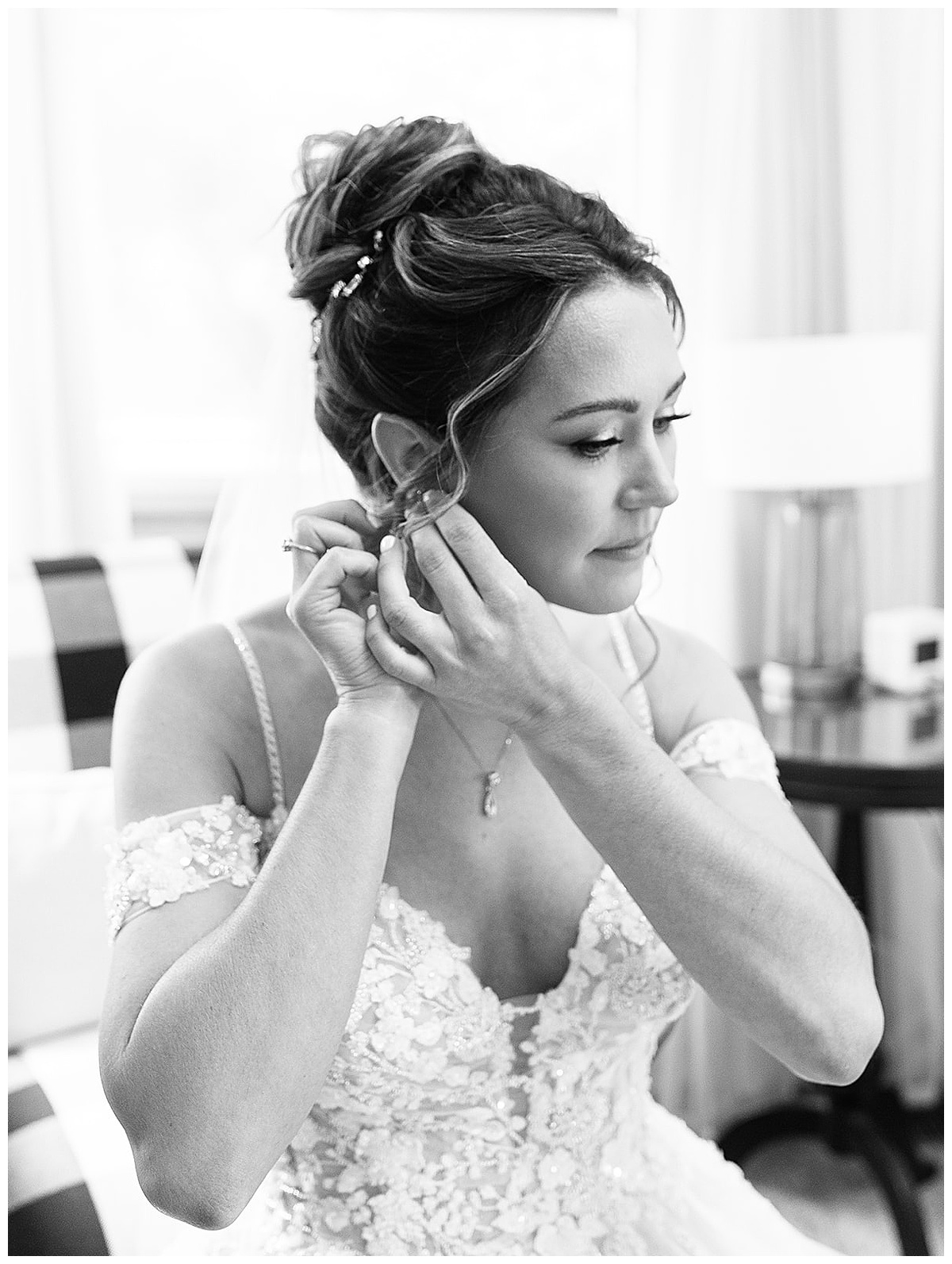 Bride adjust earrings for Detroit Wedding Photographer