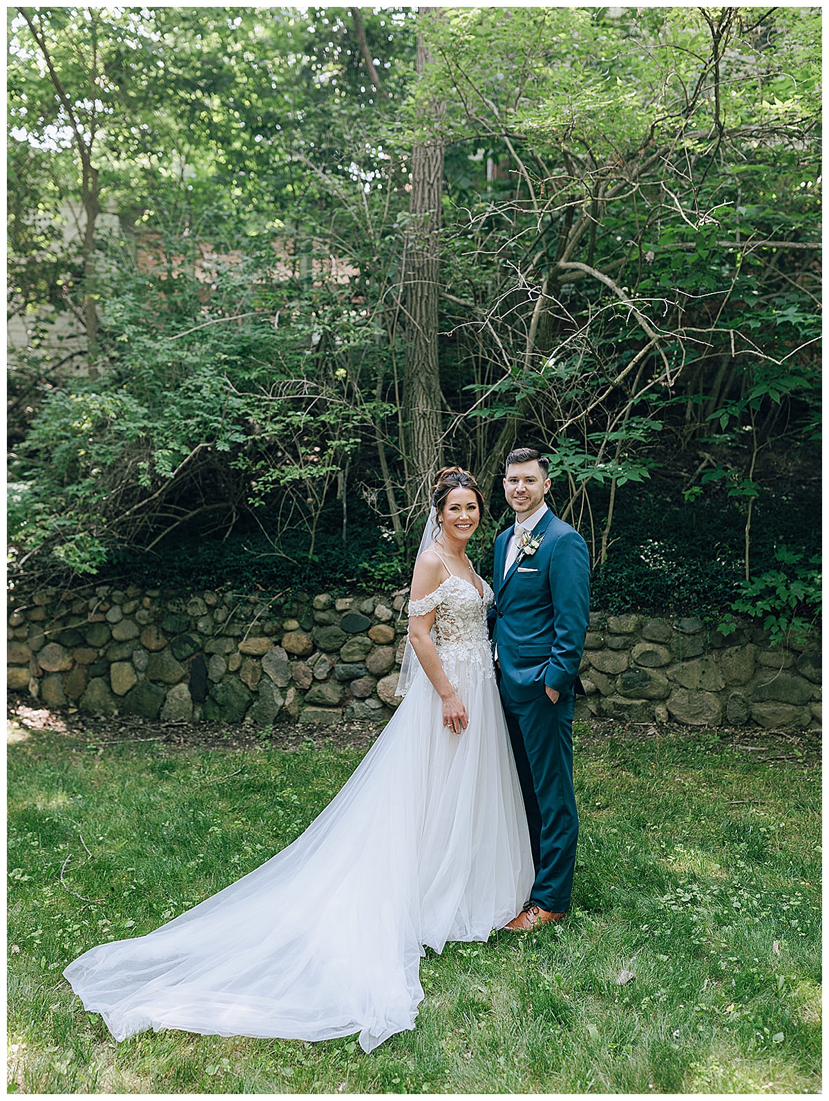 Gorgeous couple stand together at their Holly, Michigan Wedding Venue 