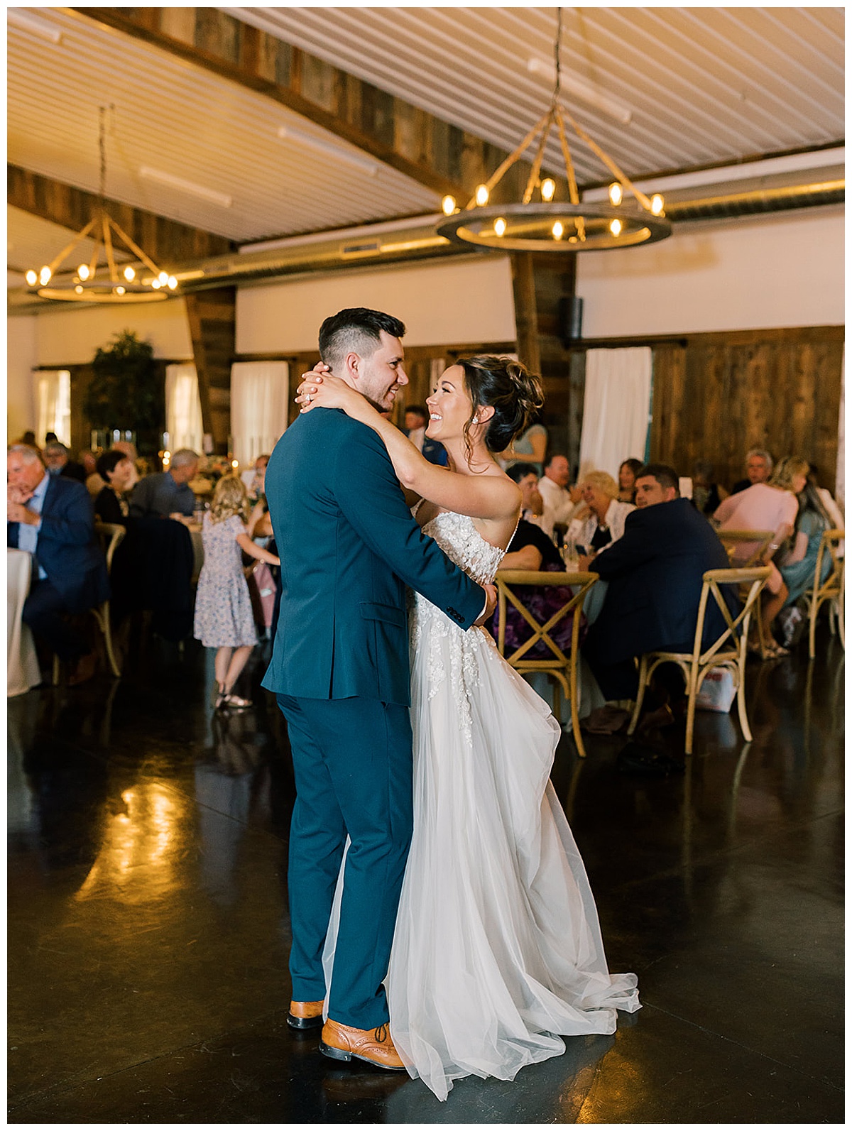 Husband and wife share a dance at their Holly, Michigan Wedding Venue 