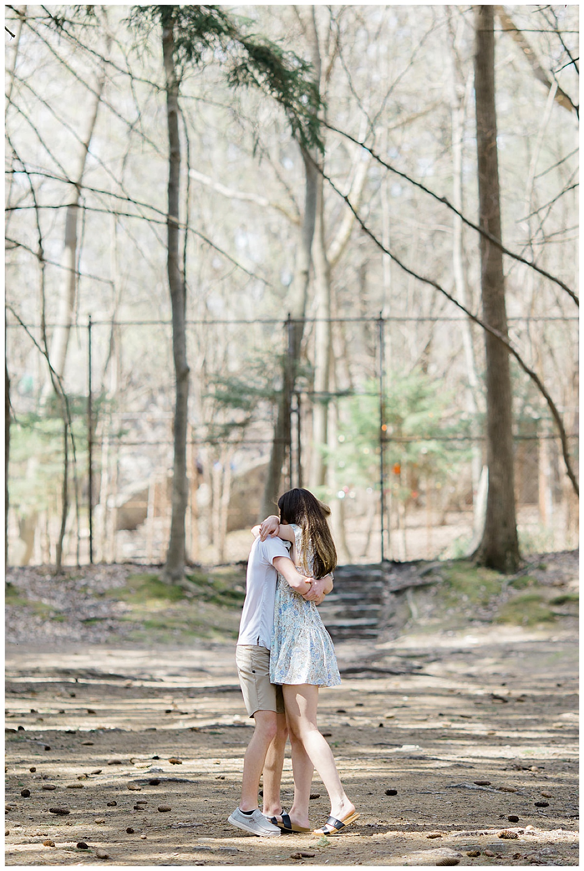 Couple share a kiss for Kayla Bouren Photography
