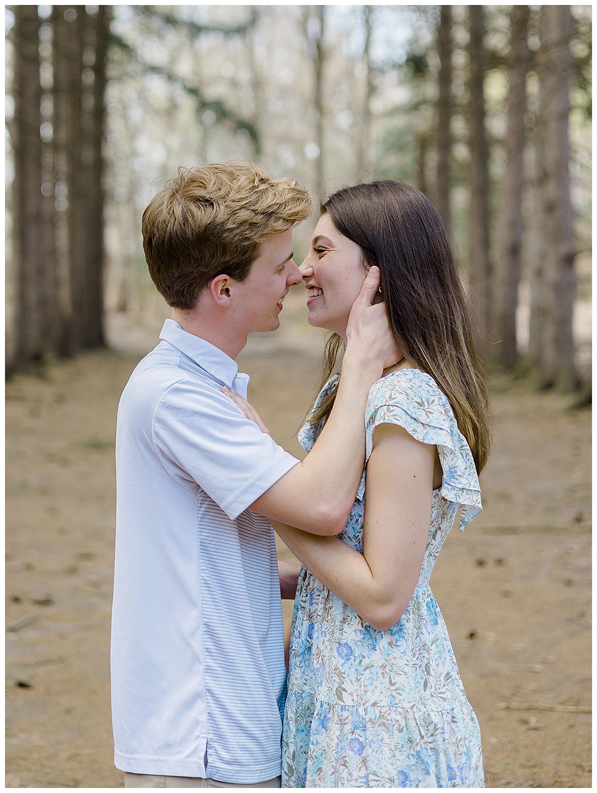 Man and woman share a kiss for Kayla Bouren Photography

