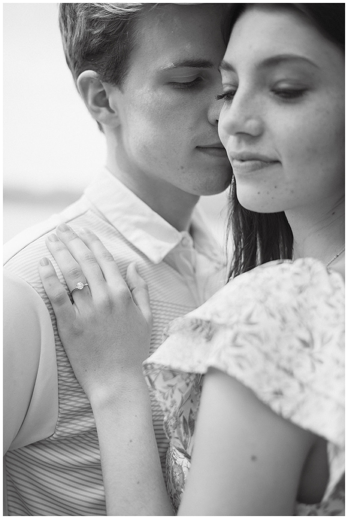 Girl rests hand on mans shoulder for Detroit Wedding Photographer