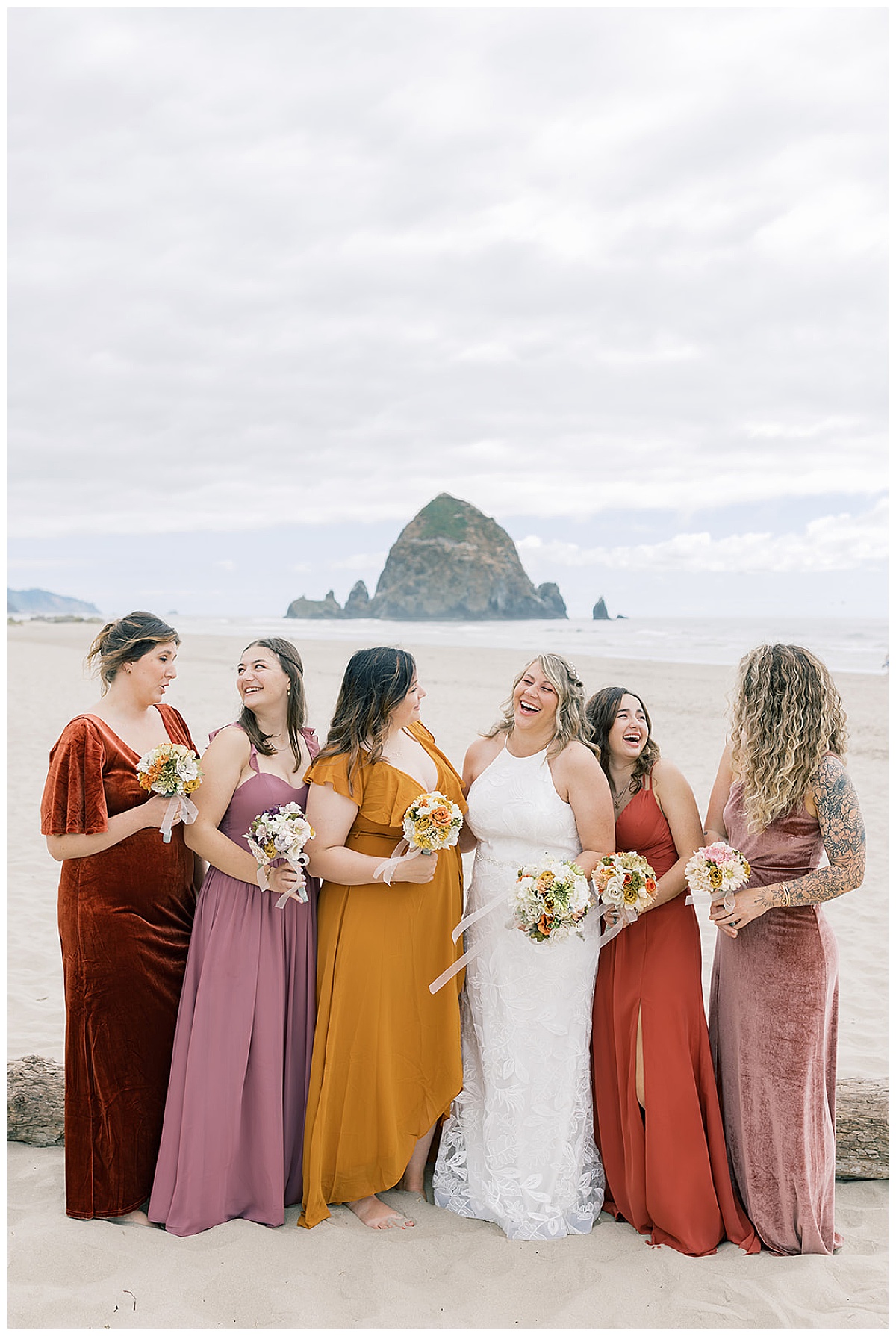Bridesmaids laugh and smile with bride for  Detroit Wedding Photographer