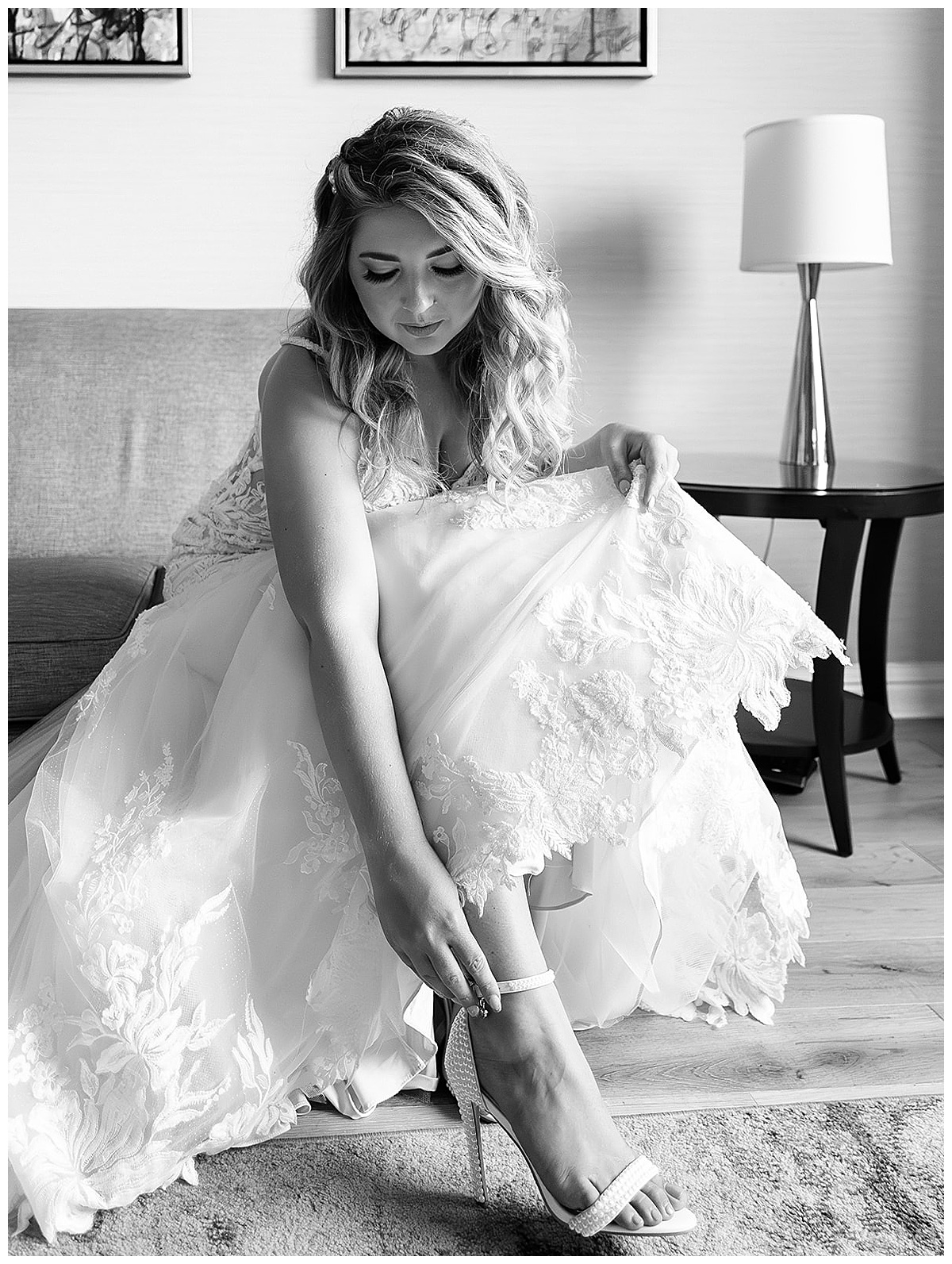 Woman puts on bridal shoes for Detroit Wedding Photographer