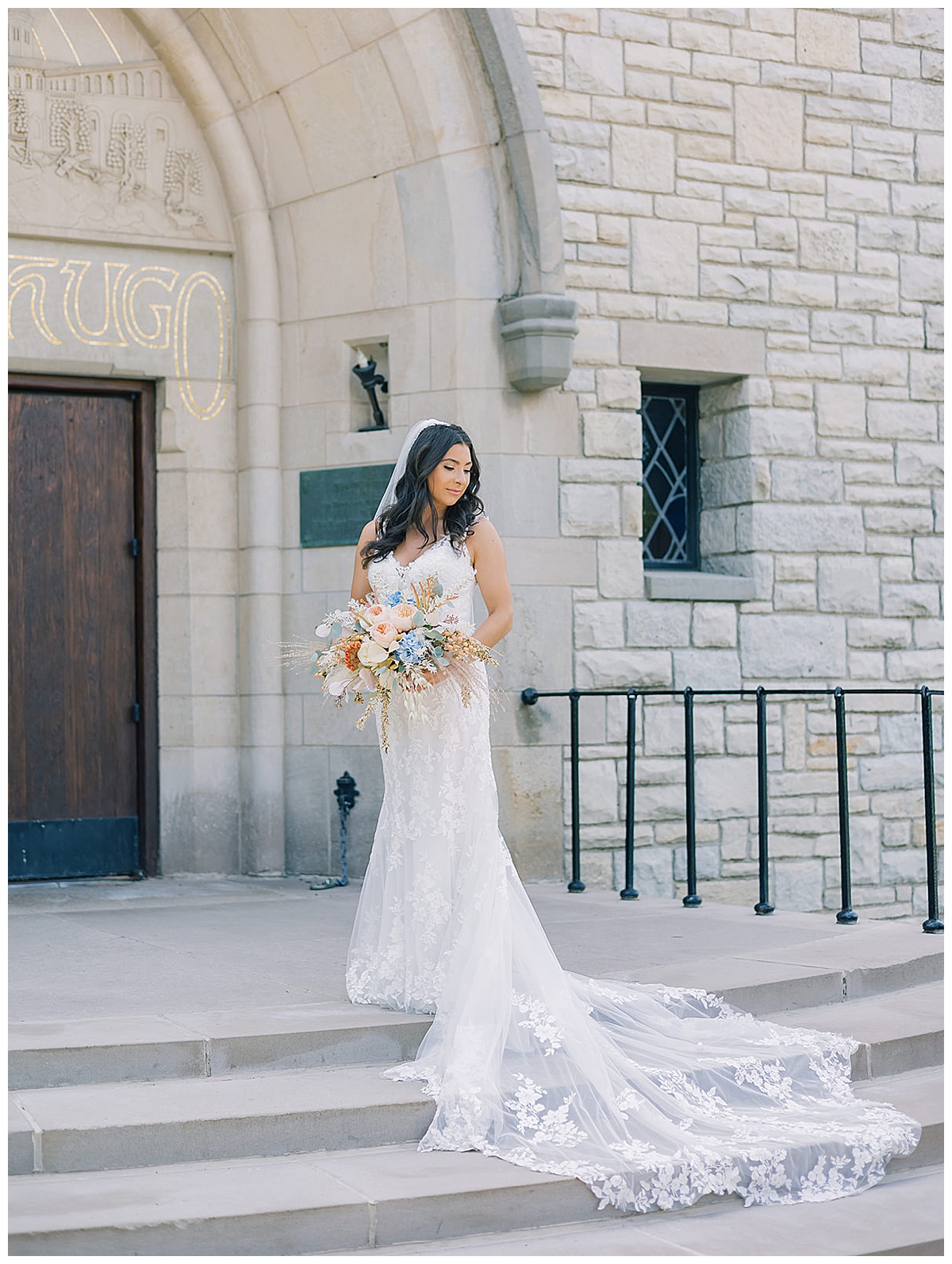 Bride stands in front of church for Kayla Bouren Photography
