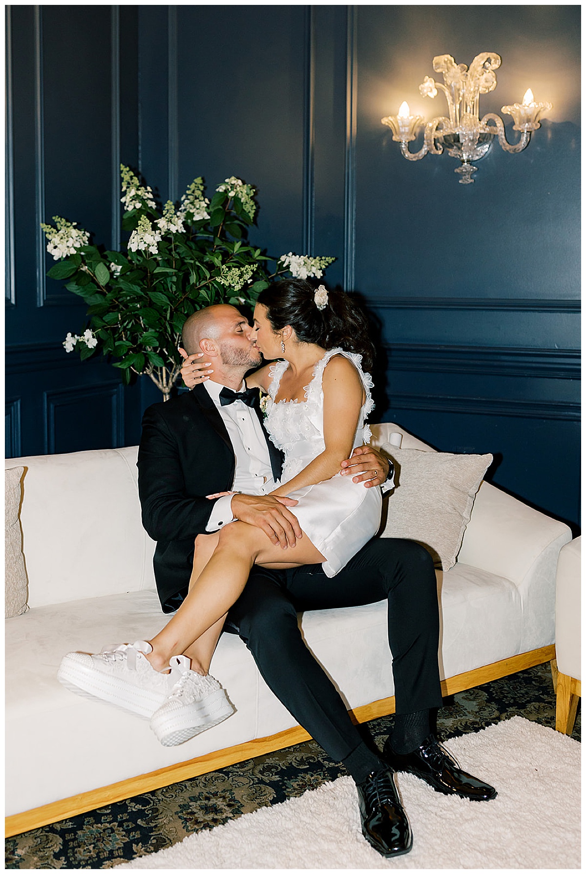 Husband and wife share kiss for Kayla Bouren Photography

