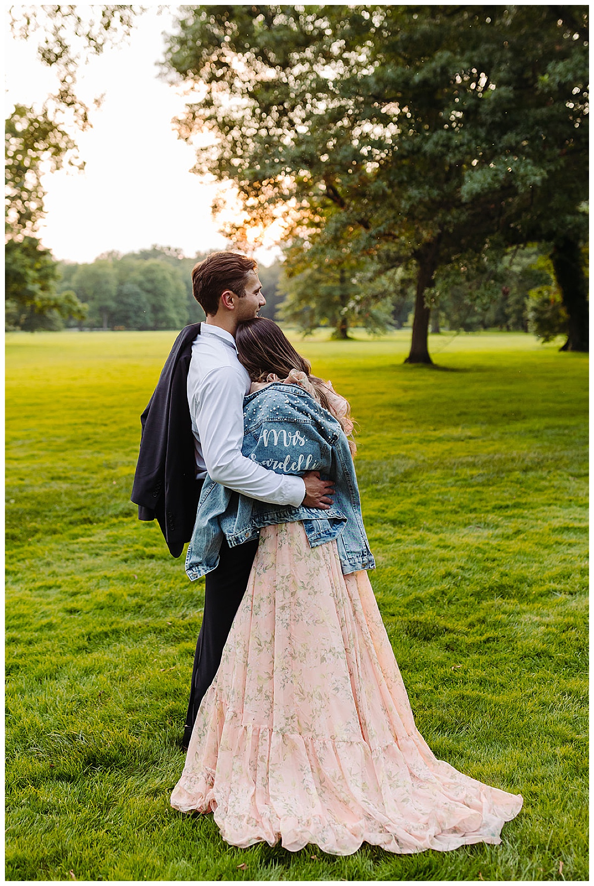 The couple hold each other close at one of the estate engagement session locations in Michigan