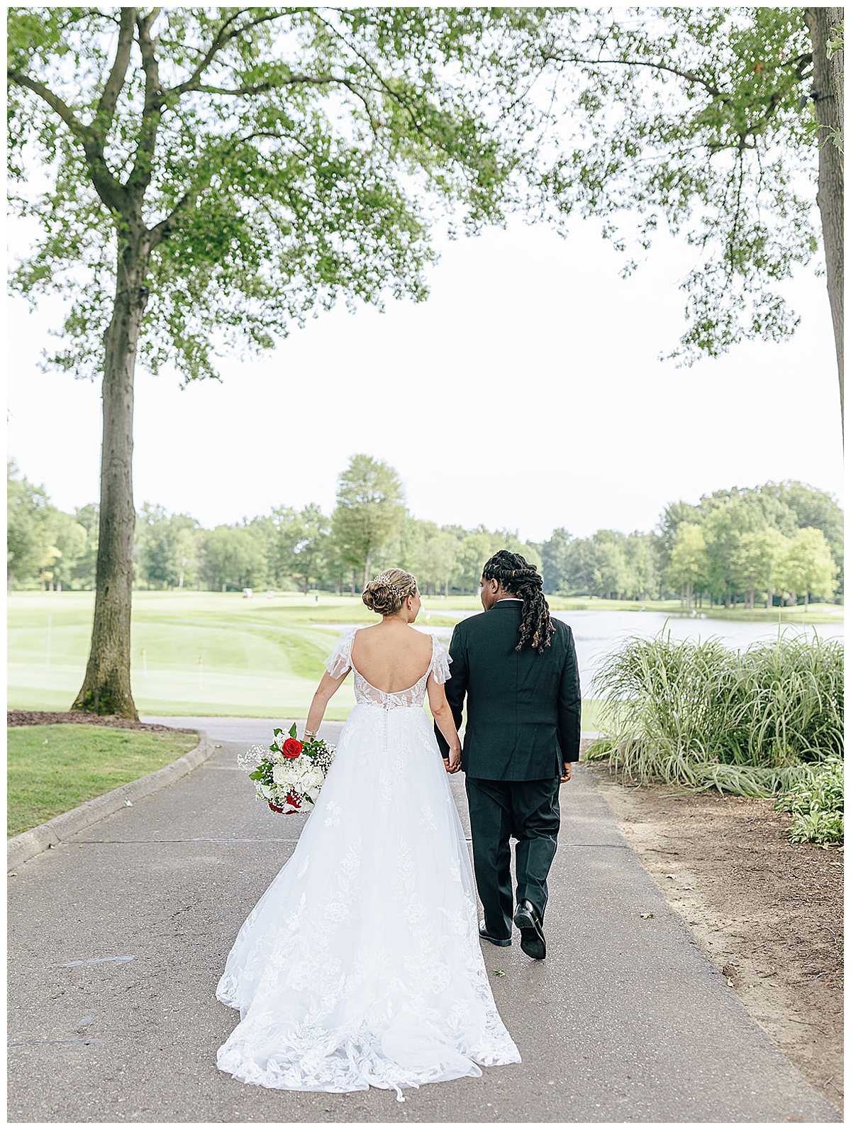 Husband and wife walk together for  Detroit Wedding Photographer