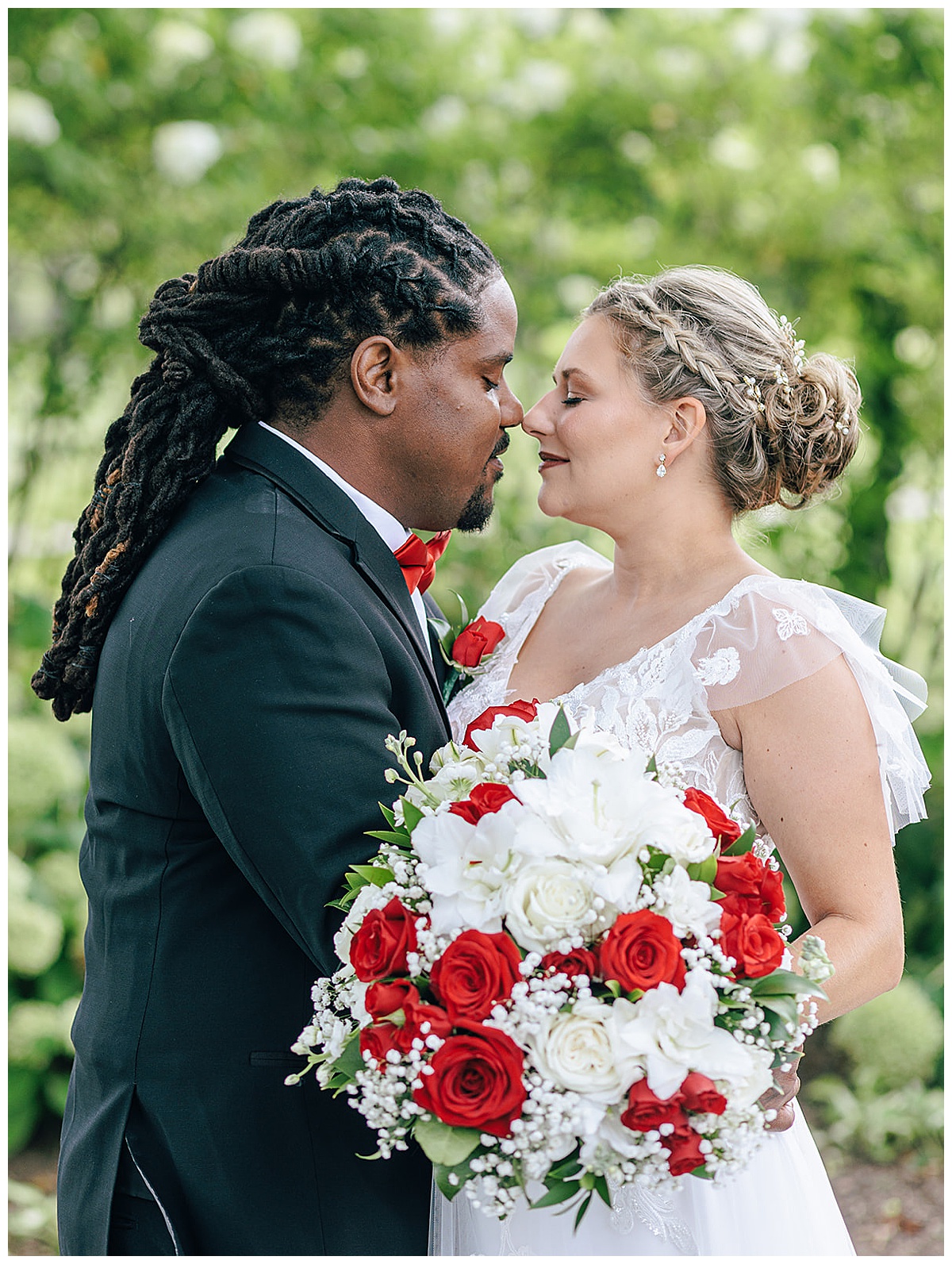 Husband and wife go nose to nost for Detroit Wedding Photographer