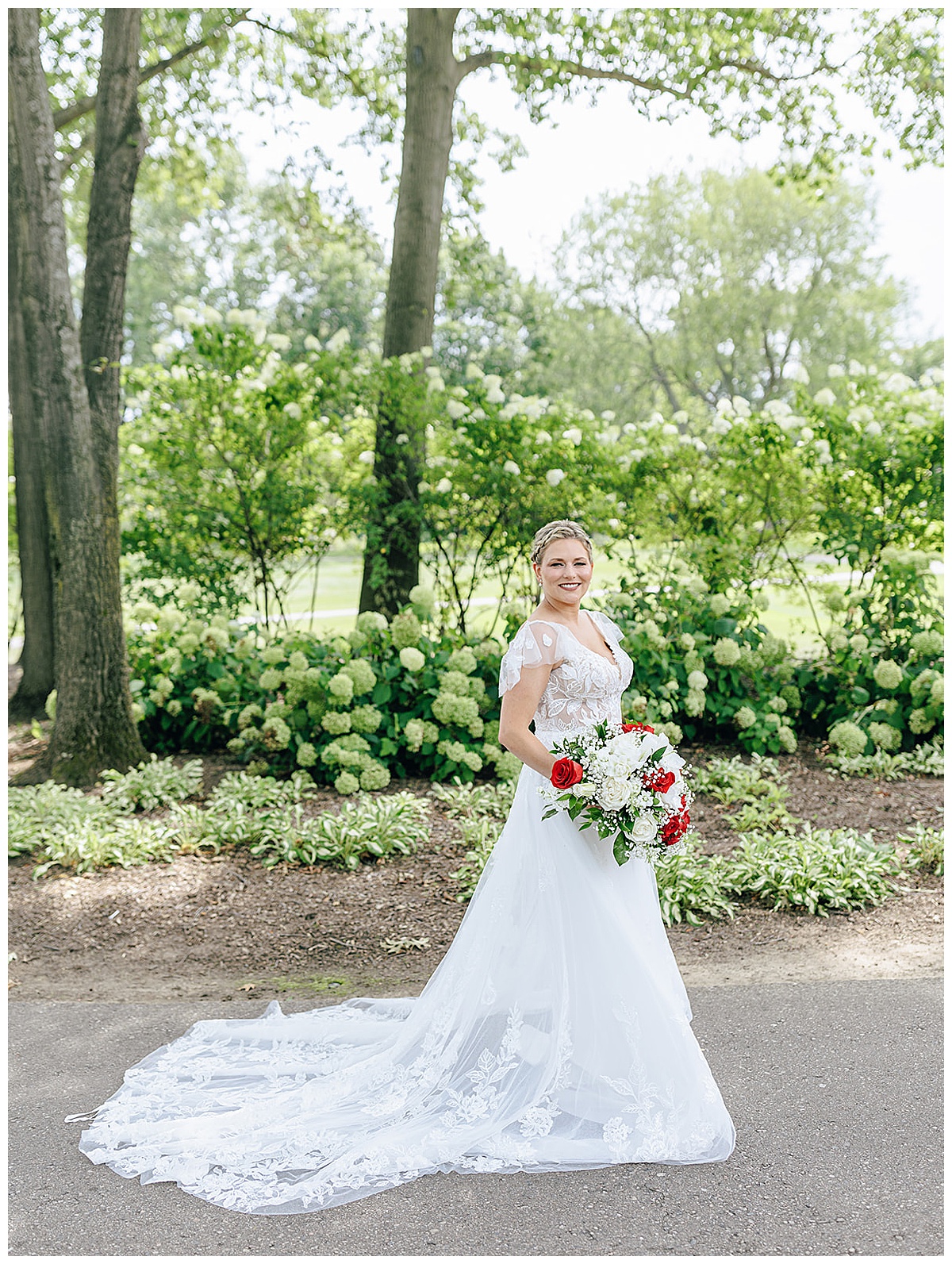 Bride shares a big smile for Kayla Bouren Photography