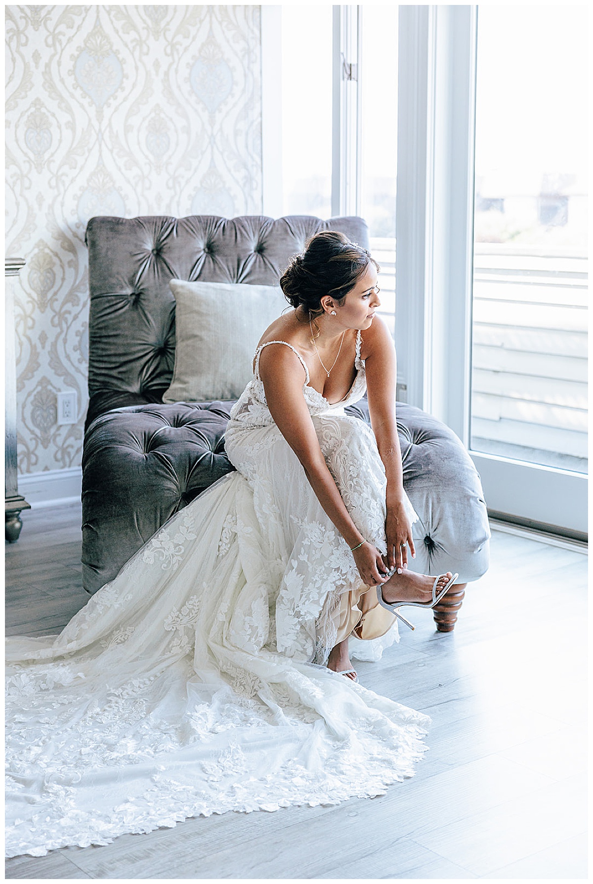 Brides puts on wedding shoes for Detroit Wedding Photographer