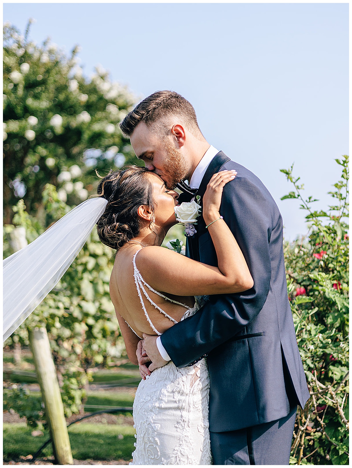 Couple share a tender moment for Kayla Bouren Photography