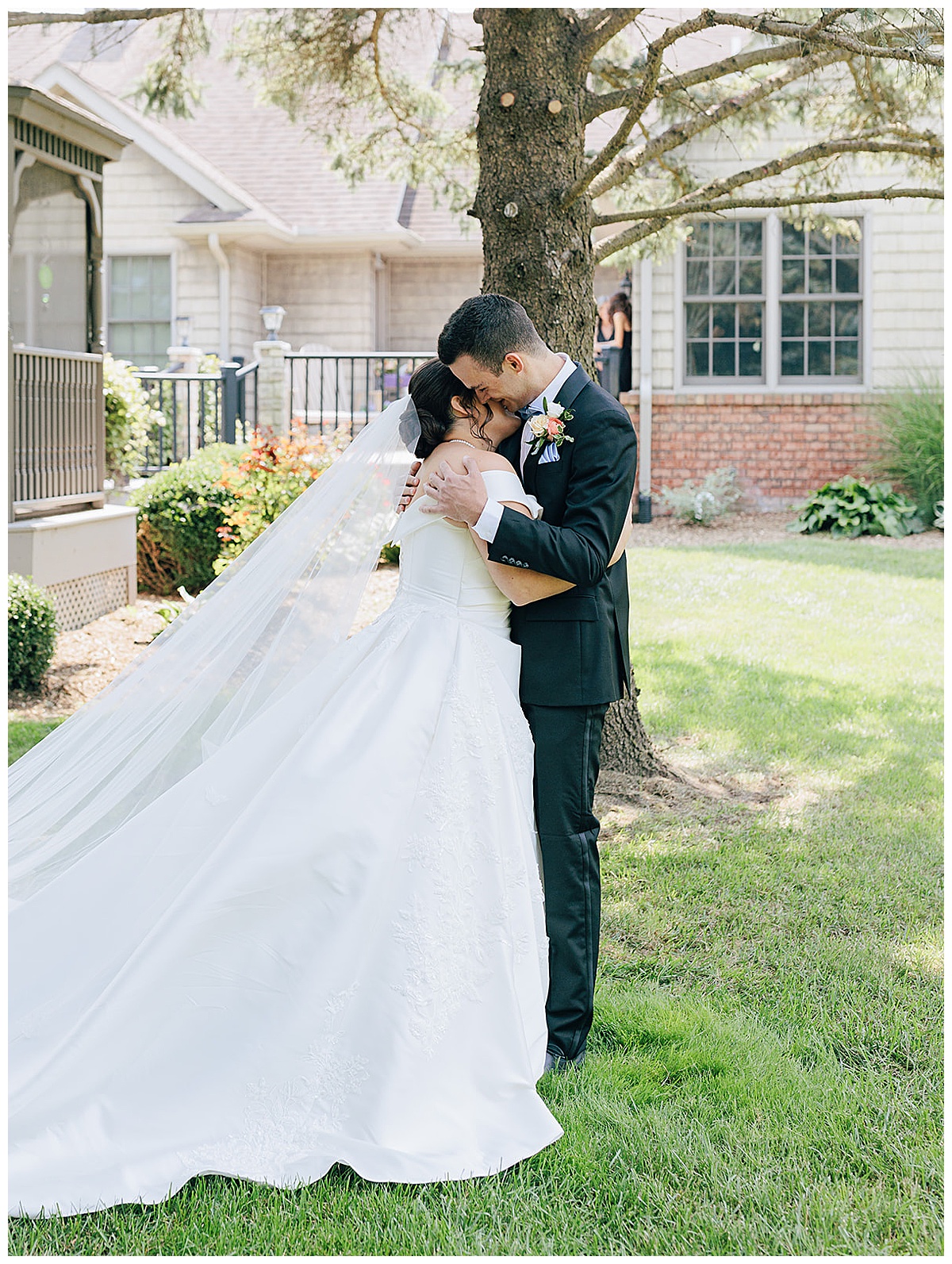 Bride and groom share a hug for Detroit Wedding Photographer