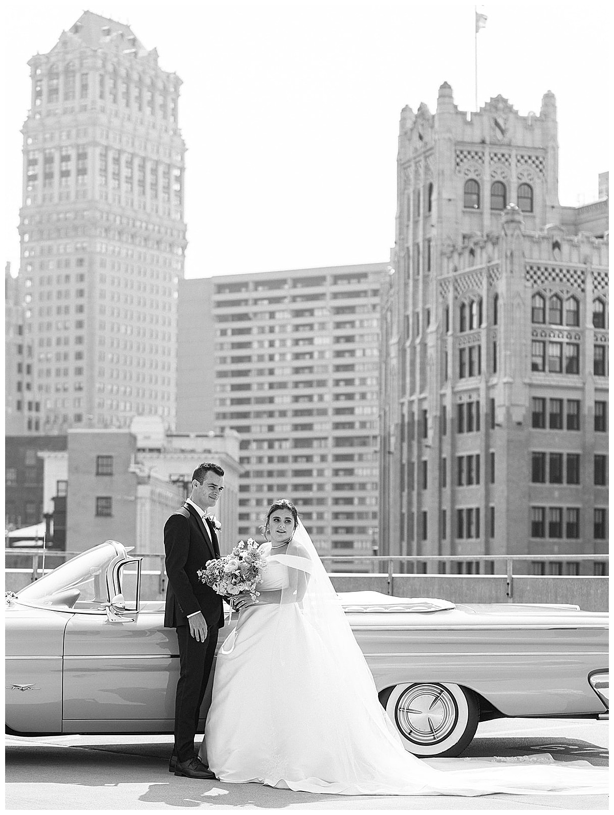 Husband and wife stand in front of vintage car for Luxury Wedding at Roostertail