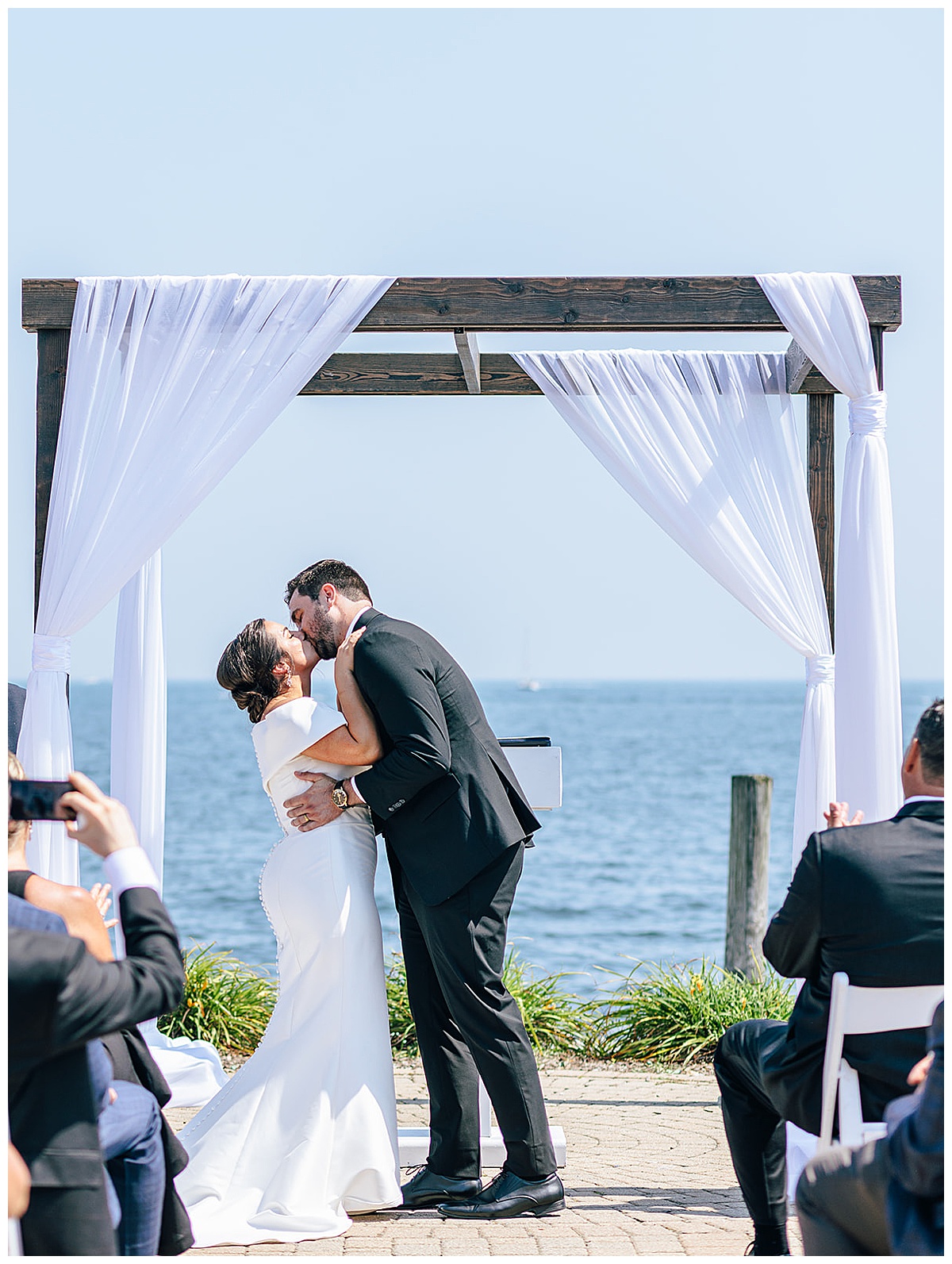 Husband and wife share a kiss for Detroit Wedding Photographer 