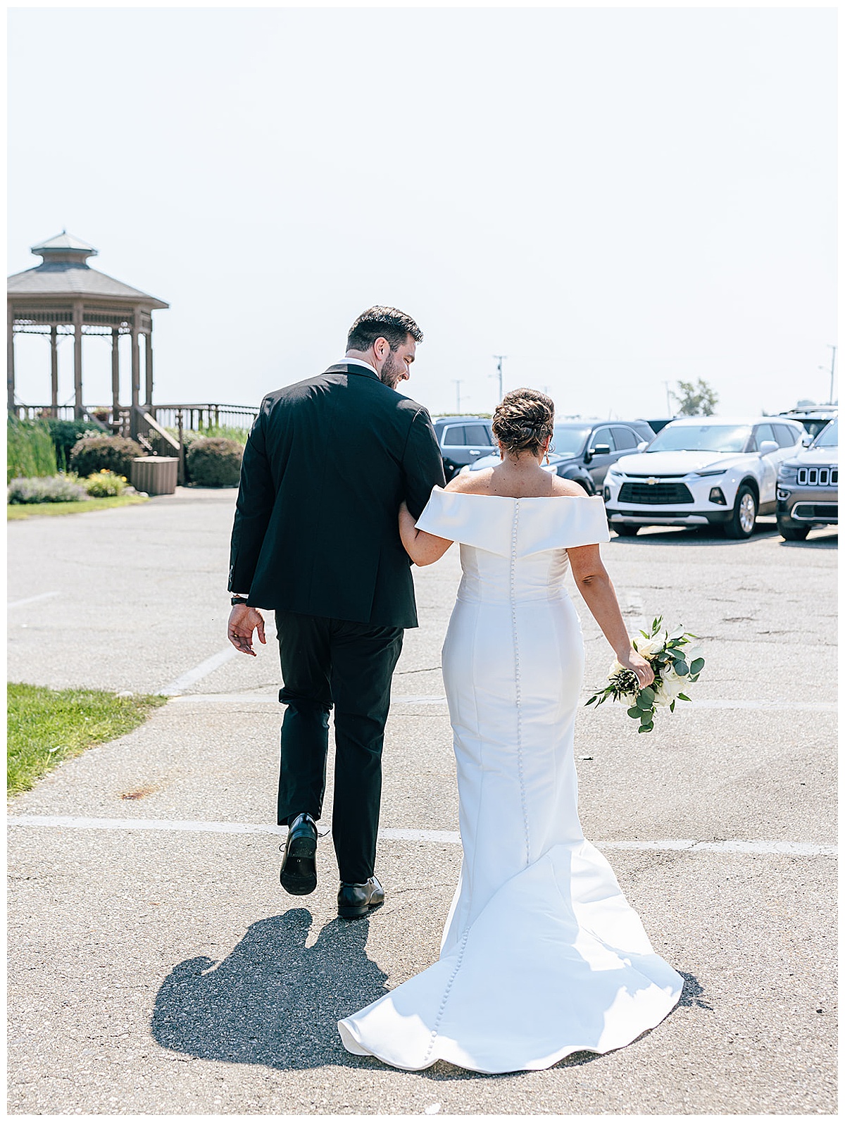 Husband and wife walk together for Yacht Charter Wedding 