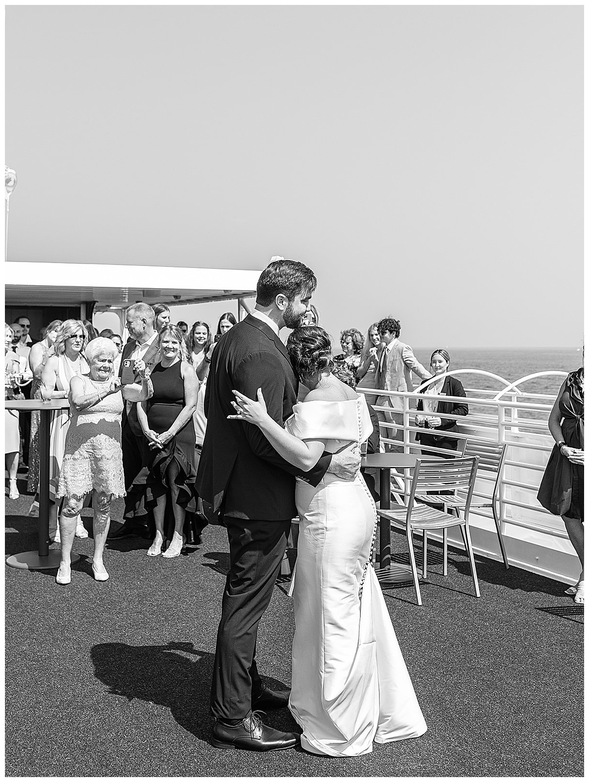Bride and groom share their first dance during their Yacht Charter Wedding 